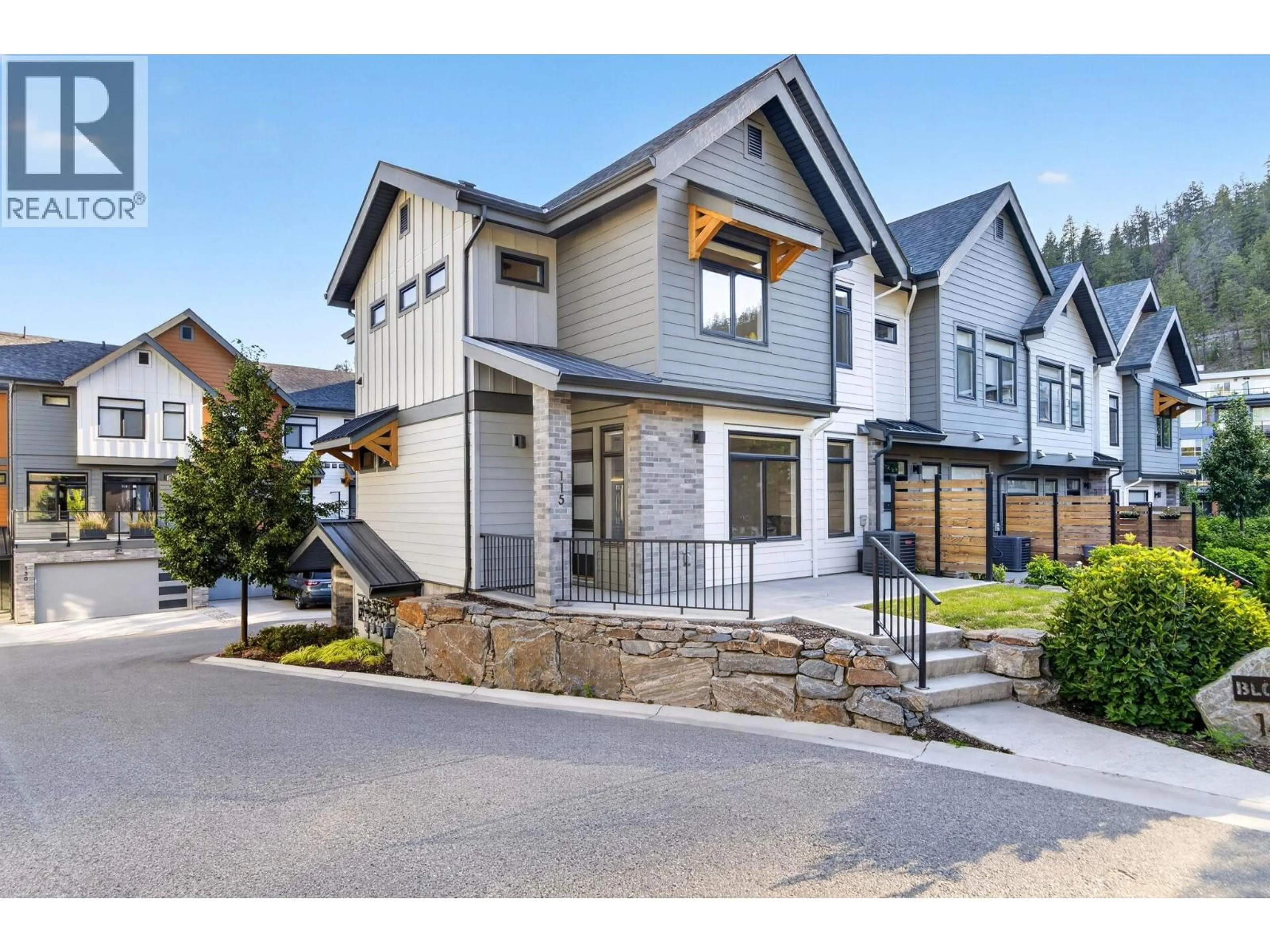 Home with brick exterior material, street for 115 - 1435 CARA GLEN COURT, Kelowna British Columbia V1V0G1