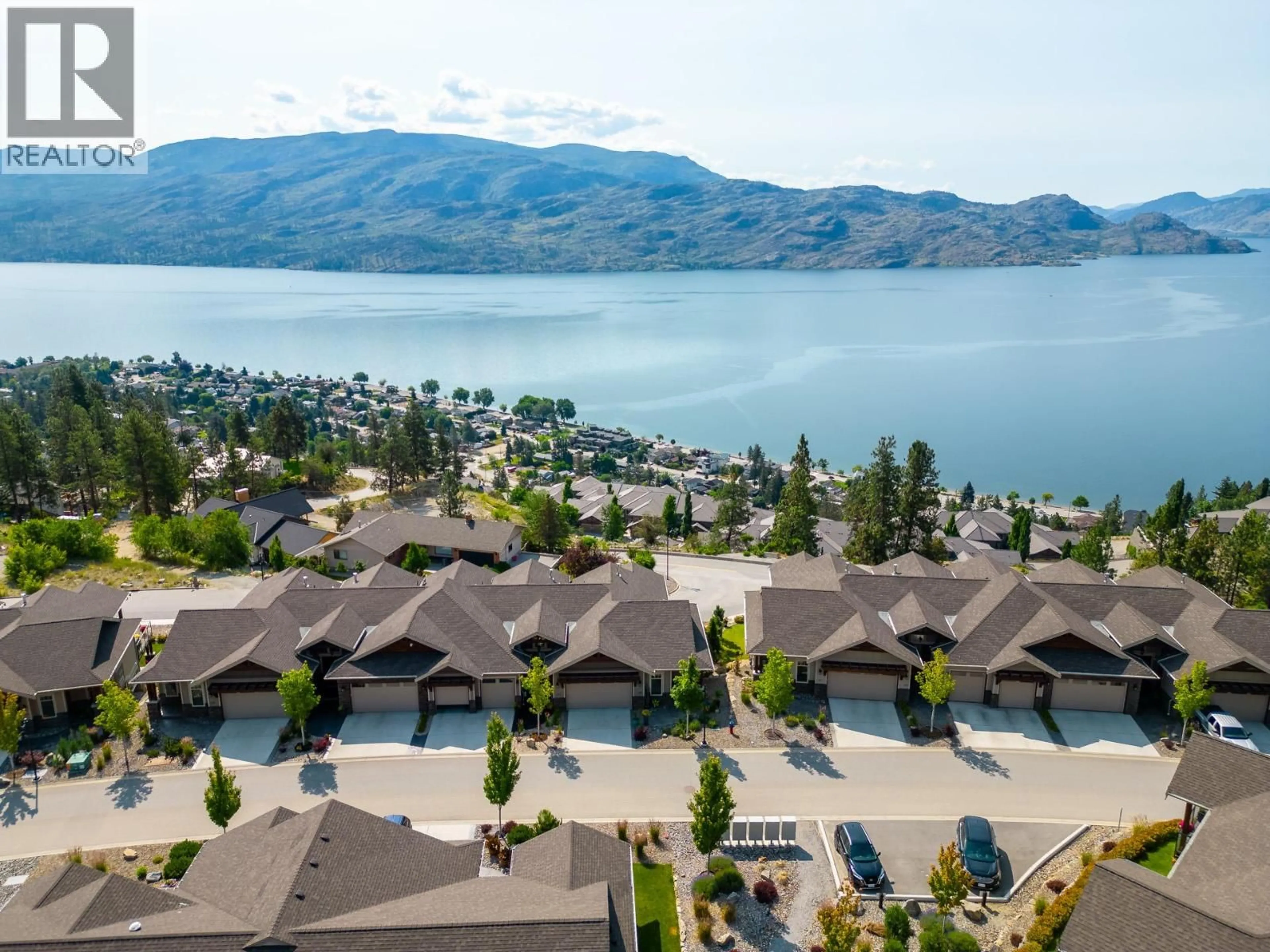 A pic from outside/outdoor area/front of a property/back of a property/a pic from drone, water/lake/river/ocean view for 117 - 4000 TRAILS PLACE, Peachland British Columbia V0H1X5