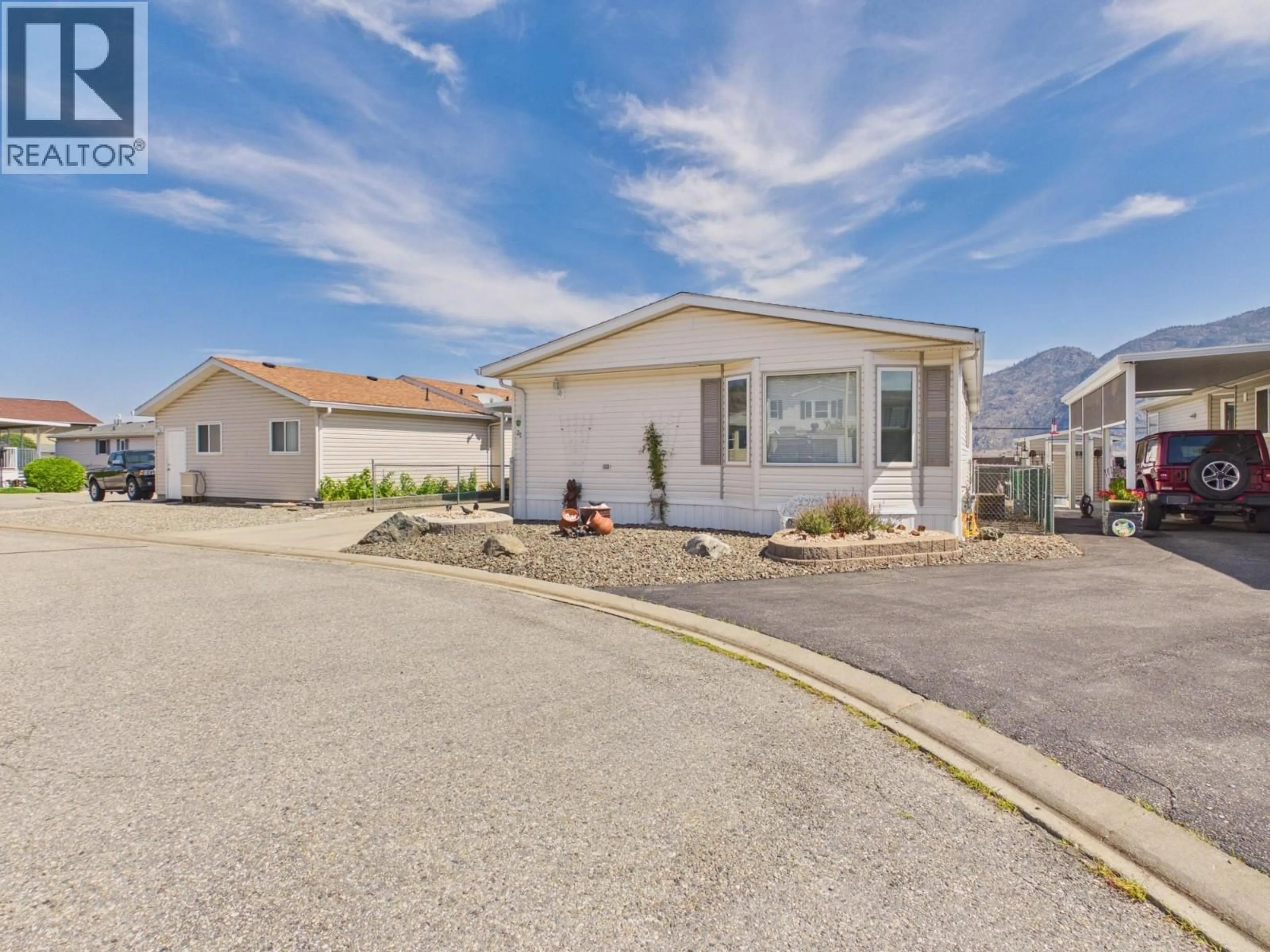 Home with vinyl exterior material, mountain view for 30 - 9410 115TH STREET, Osoyoos British Columbia V0H1V5