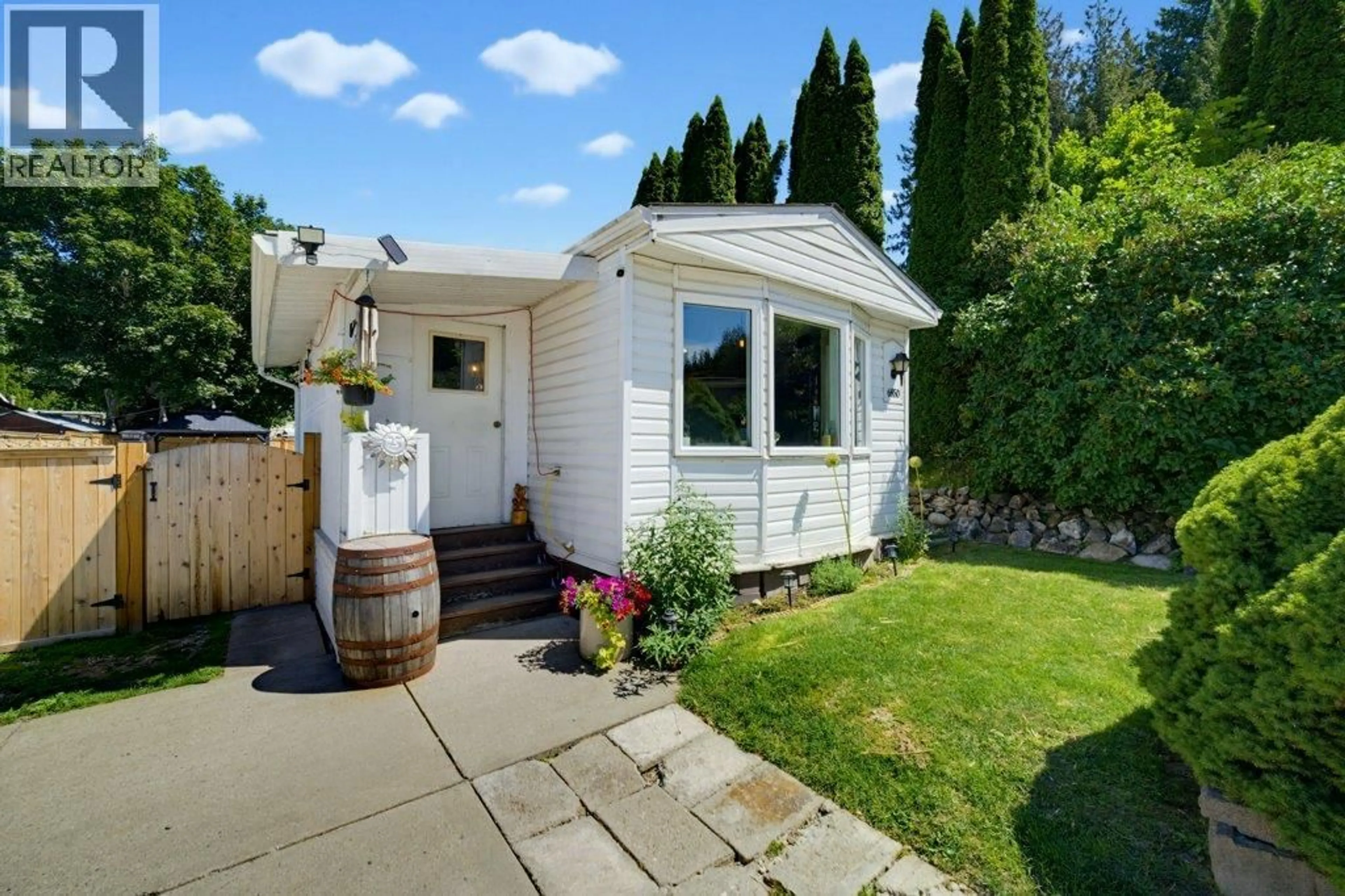 Home with vinyl exterior material, street for 6850 53 STREET NORTHEAST, Salmon Arm British Columbia V0E1K0