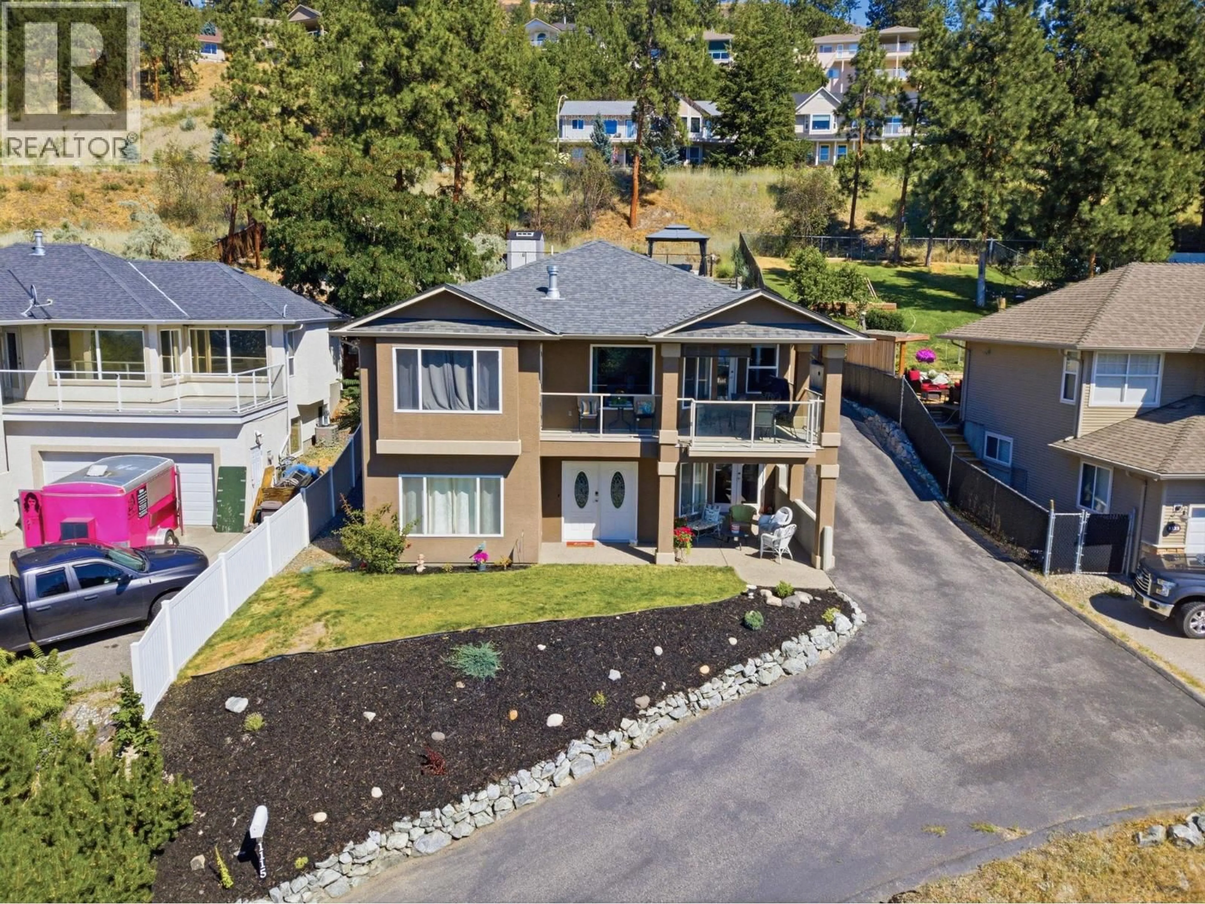 A pic from outside/outdoor area/front of a property/back of a property/a pic from drone, street for 1115 BENTIEN ROAD, Kelowna British Columbia V1X6R9