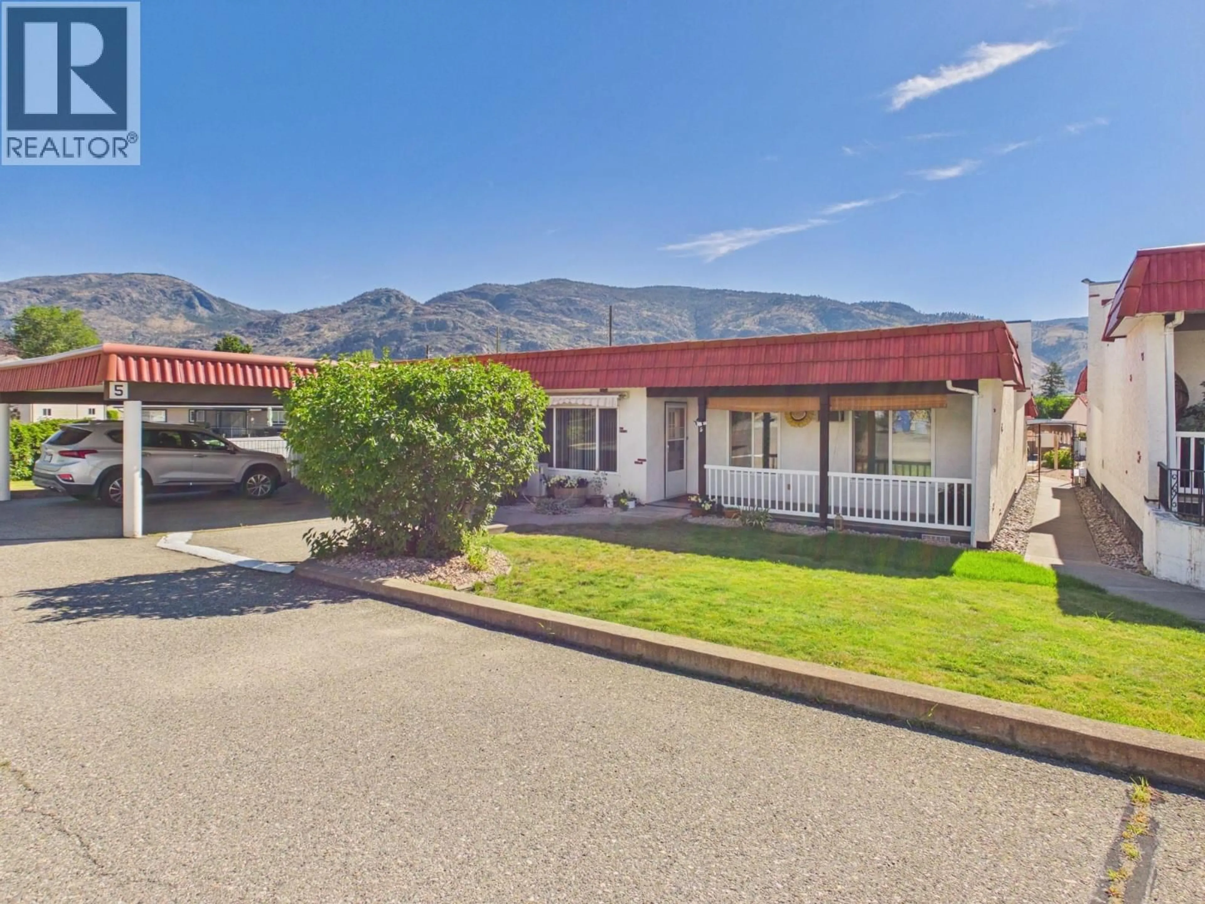 A pic from outside/outdoor area/front of a property/back of a property/a pic from drone, mountain view for 5 - 8010 VEDETTE DRIVE, Osoyoos British Columbia V0H1V2