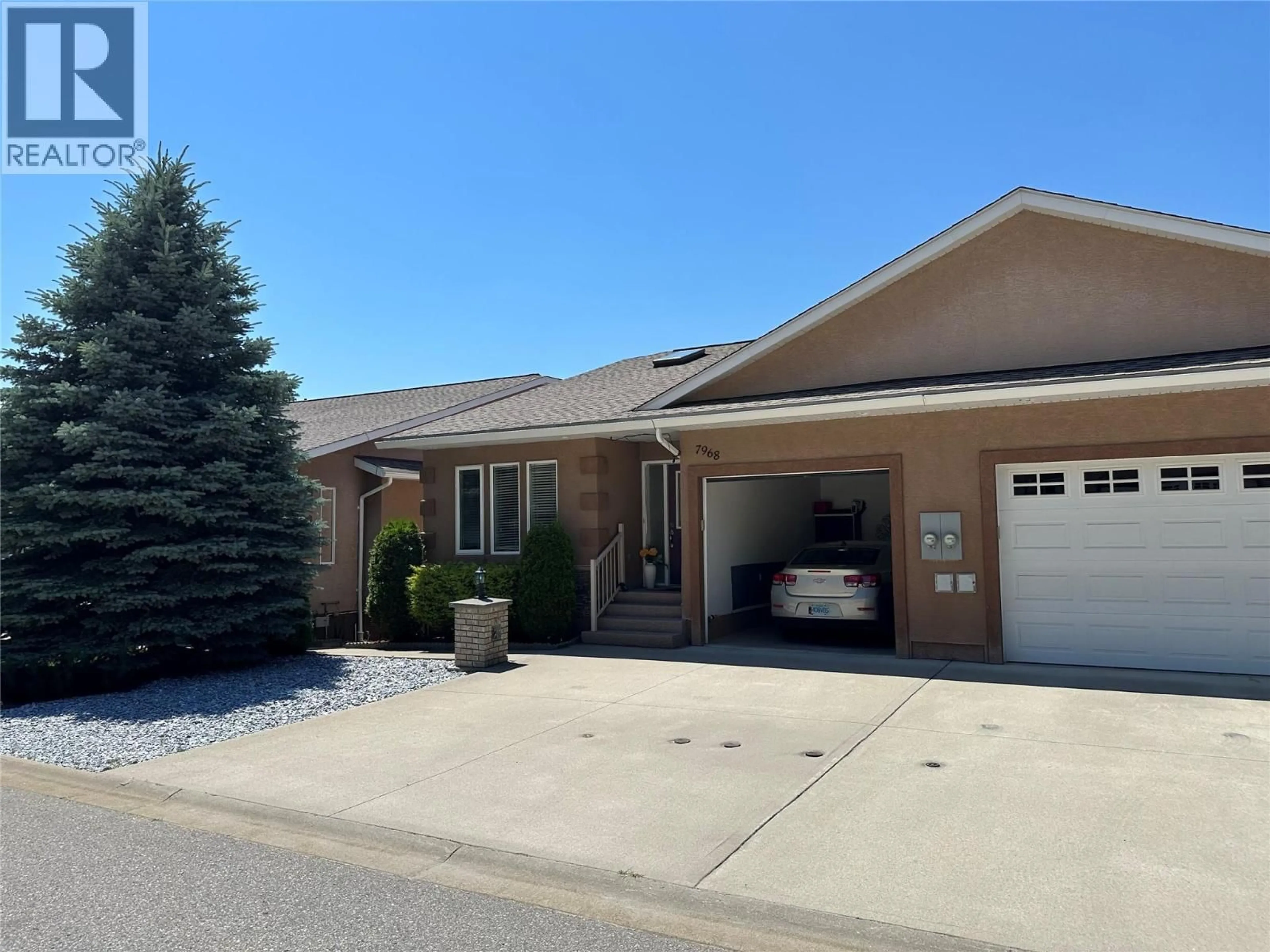 Home with vinyl exterior material, street for 7968 BIRCHWOOD DRIVE, Trail British Columbia V1R4Y3
