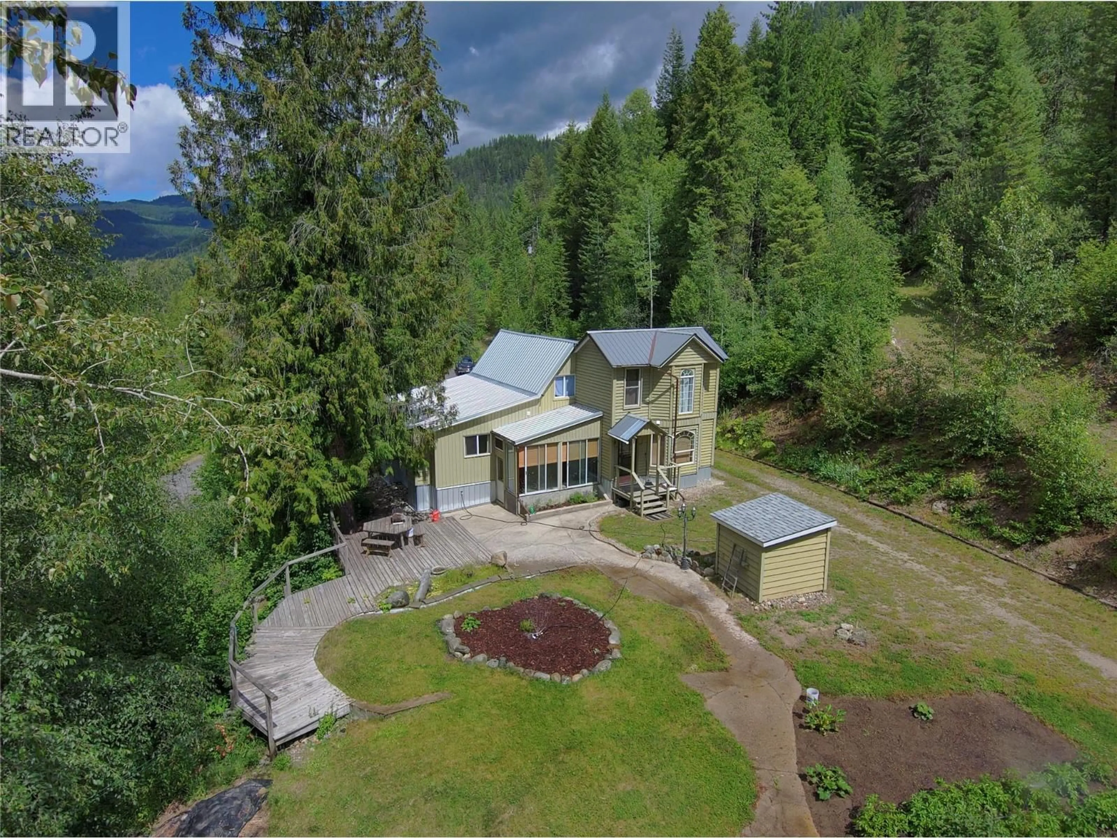A pic from outside/outdoor area/front of a property/back of a property/a pic from drone, mountain view for 440 HUBSCHER ROAD, Ross Spur British Columbia V0G1L0