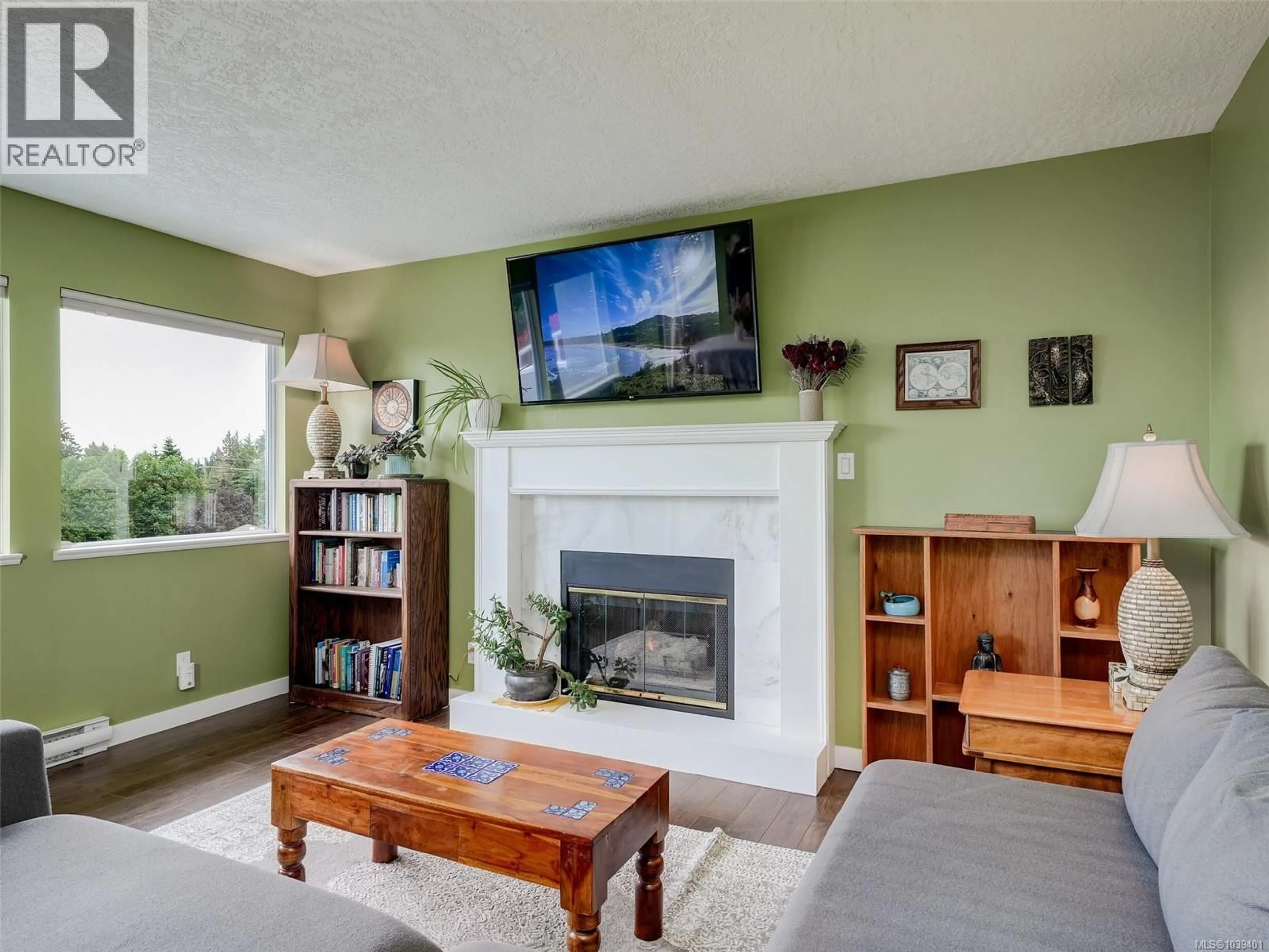 Living room with furniture, wood/laminate floor for 664 ORCA PLACE, Colwood British Columbia V9C3V1