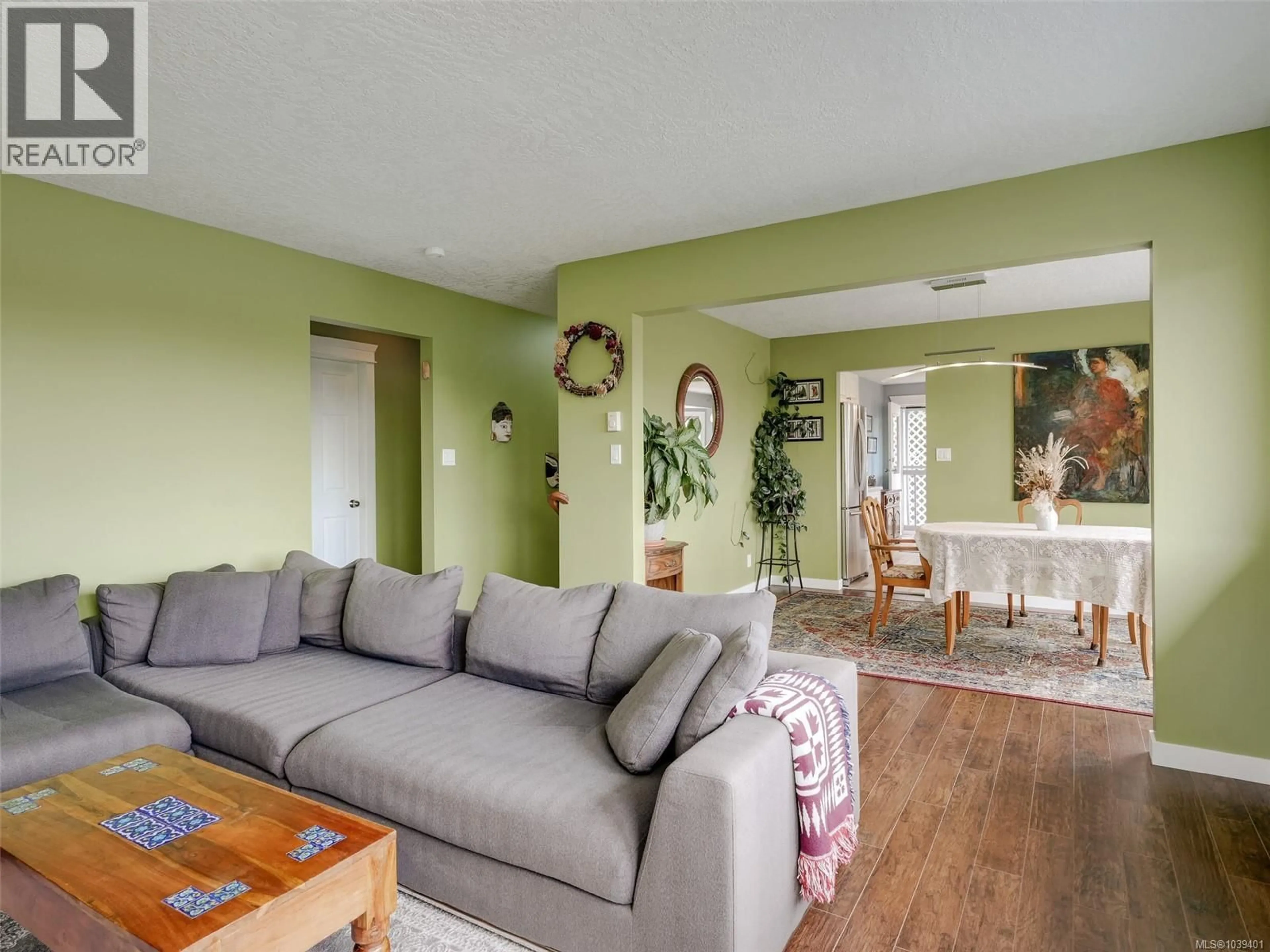 Living room with furniture, wood/laminate floor for 664 ORCA PLACE, Colwood British Columbia V9C3V1