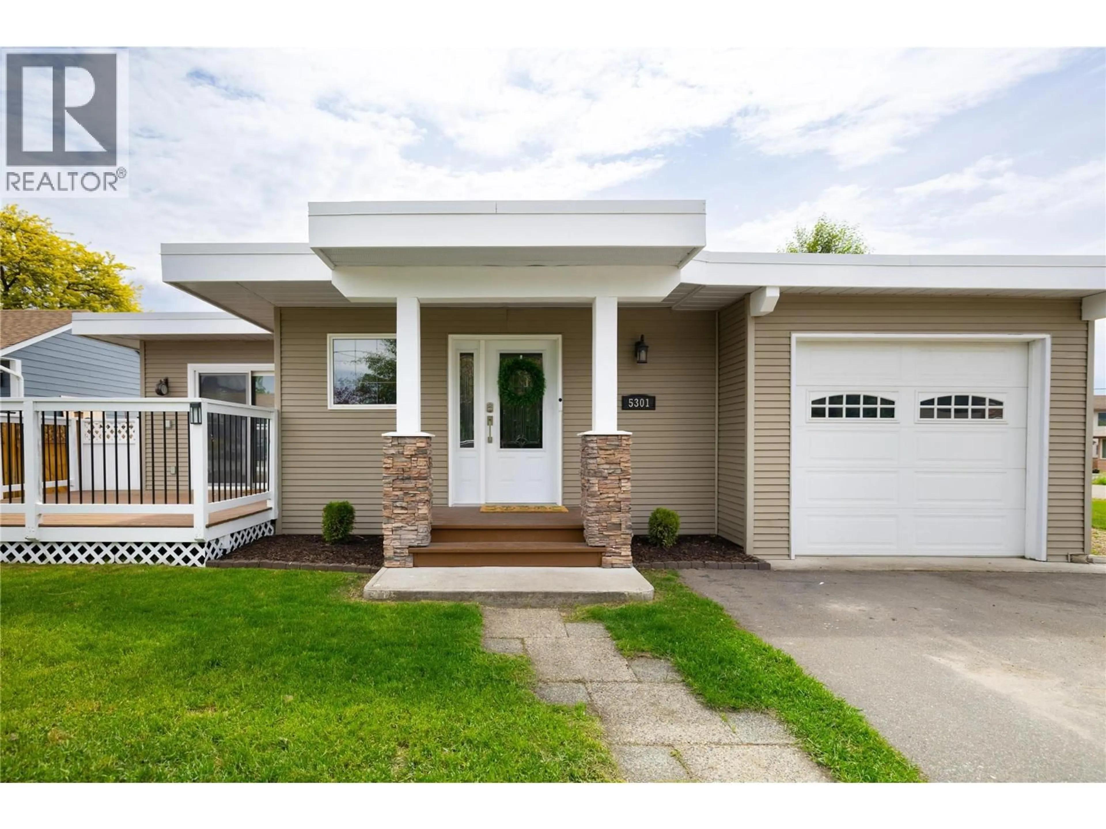 Home with vinyl exterior material, street for 5301 SPALDING ROAD, Vernon British Columbia V1B3K5