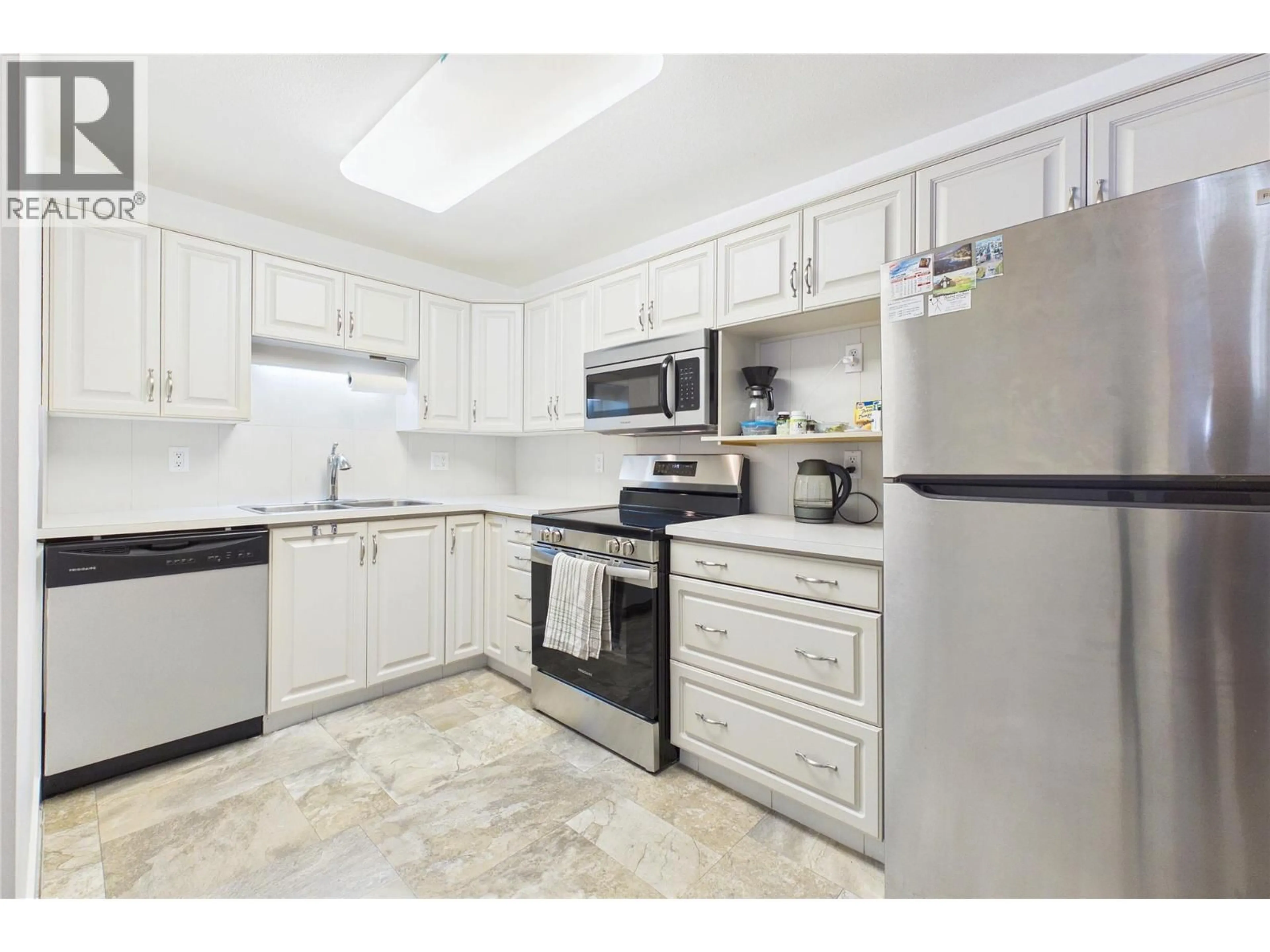 Standard kitchen, ceramic/tile floor for 205 - 920 GLENWOOD AVENUE, Kelowna British Columbia V1Y9P2