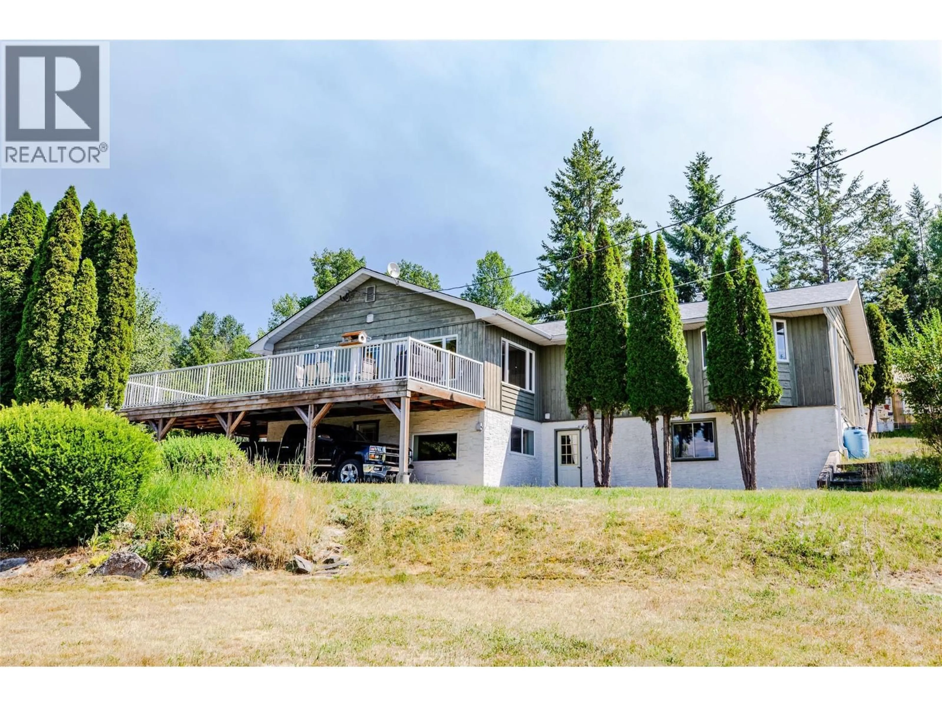 A pic from outside/outdoor area/front of a property/back of a property/a pic from drone, water/lake/river/ocean view for 2471 38TH STREET, Creston British Columbia V0B1G2
