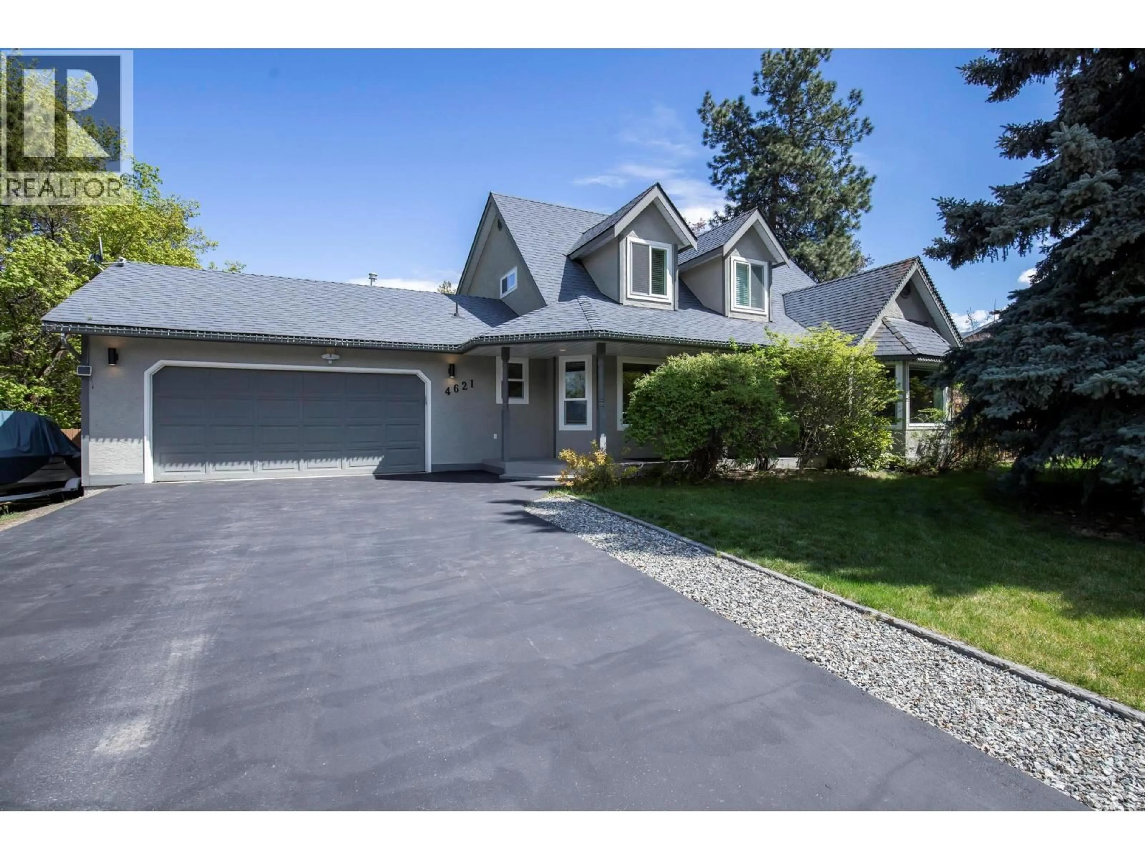 Home with vinyl exterior material, street for 4621 PARKRIDGE DRIVE, Kelowna British Columbia V1W3A9