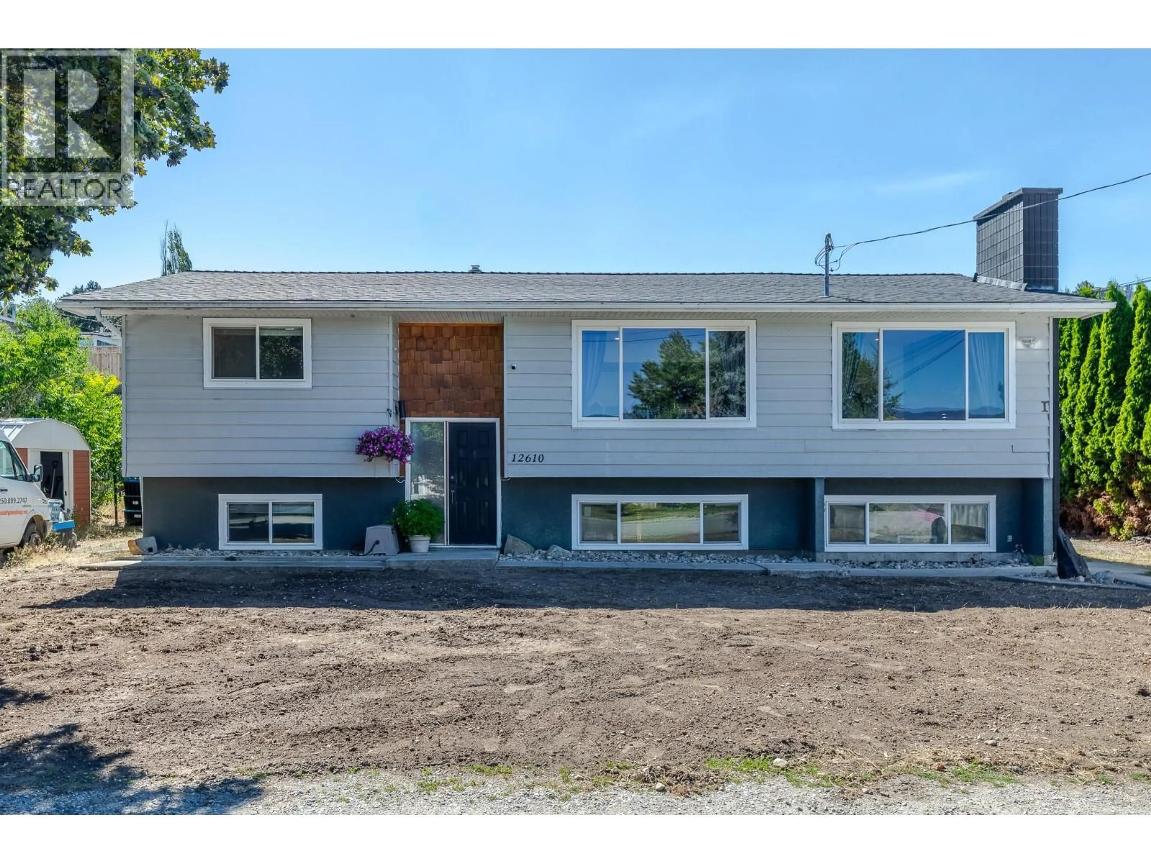 Home with vinyl exterior material, street for 12610 WRIGHT AVENUE, Summerland British Columbia V0H1Z0
