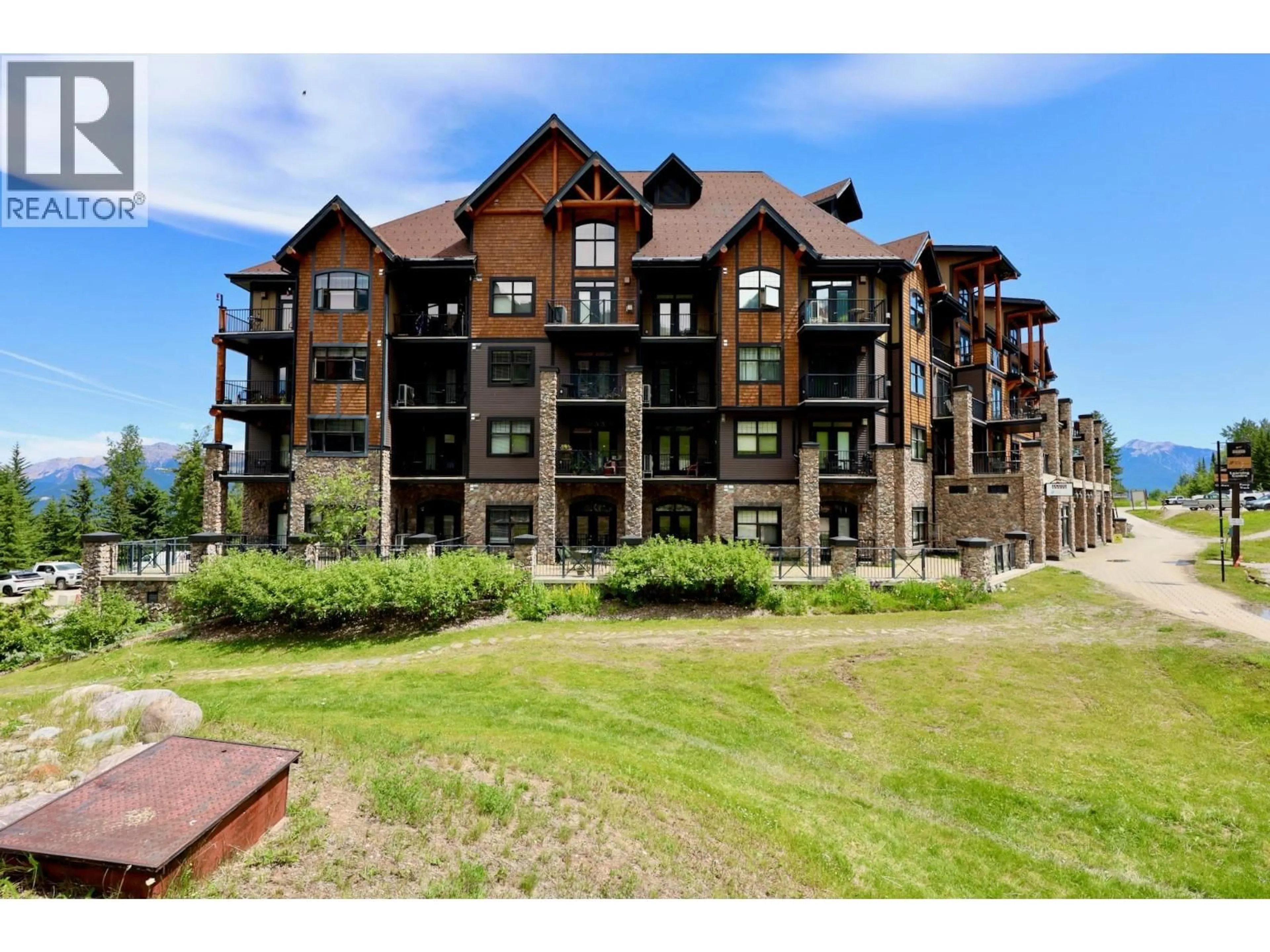 A pic from outside/outdoor area/front of a property/back of a property/a pic from drone, unknown for 206 - 1545 KICKING HORSE TRAIL, Golden British Columbia V0A1H0