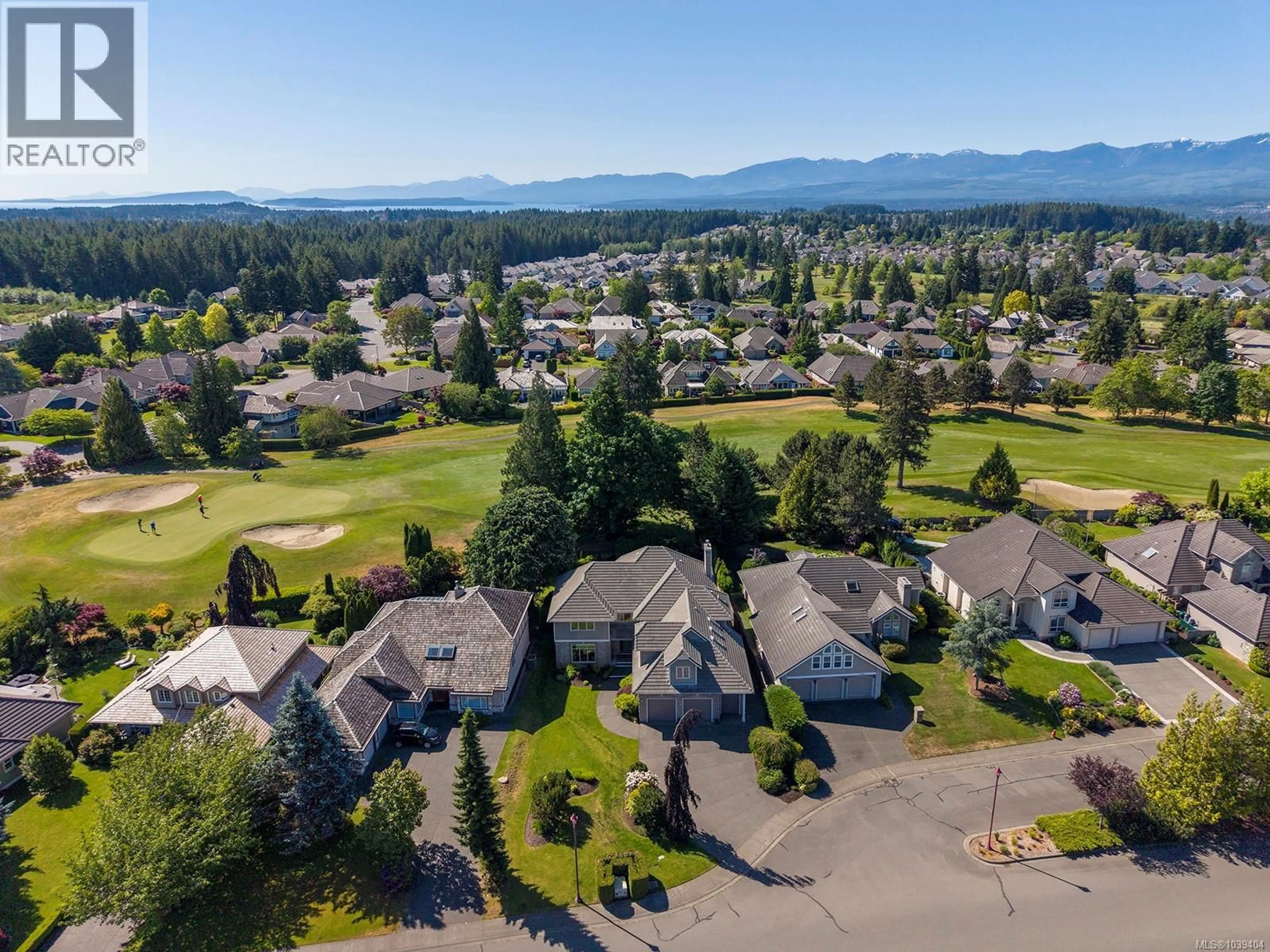 A pic from outside/outdoor area/front of a property/back of a property/a pic from drone, mountain view for 3331 ROYAL VISTA WAY, Courtenay British Columbia V9N9X6