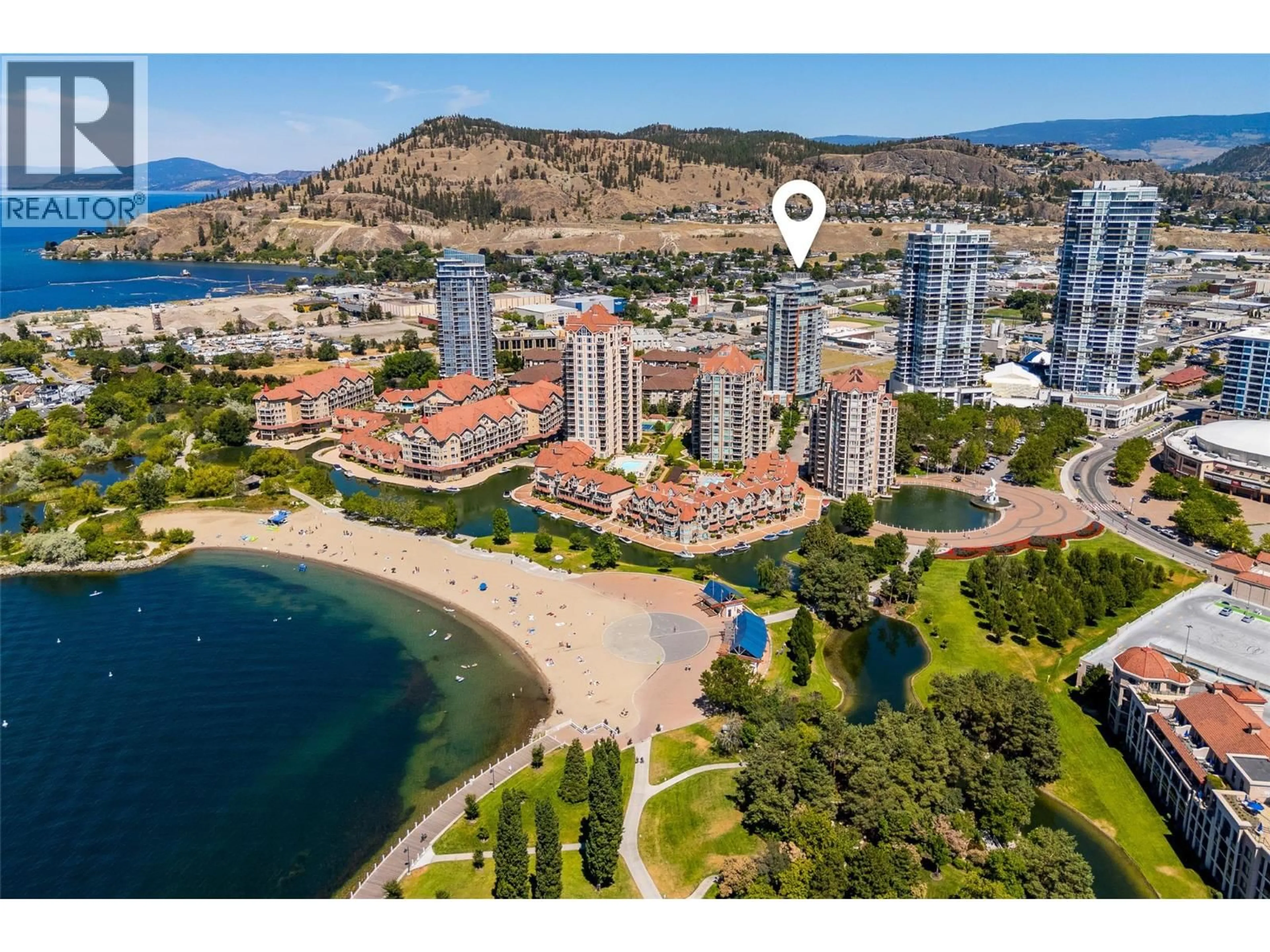A pic from outside/outdoor area/front of a property/back of a property/a pic from drone, water/lake/river/ocean view for 1706 - 1151 SUNSET DRIVE, Kelowna British Columbia V1Y0G2
