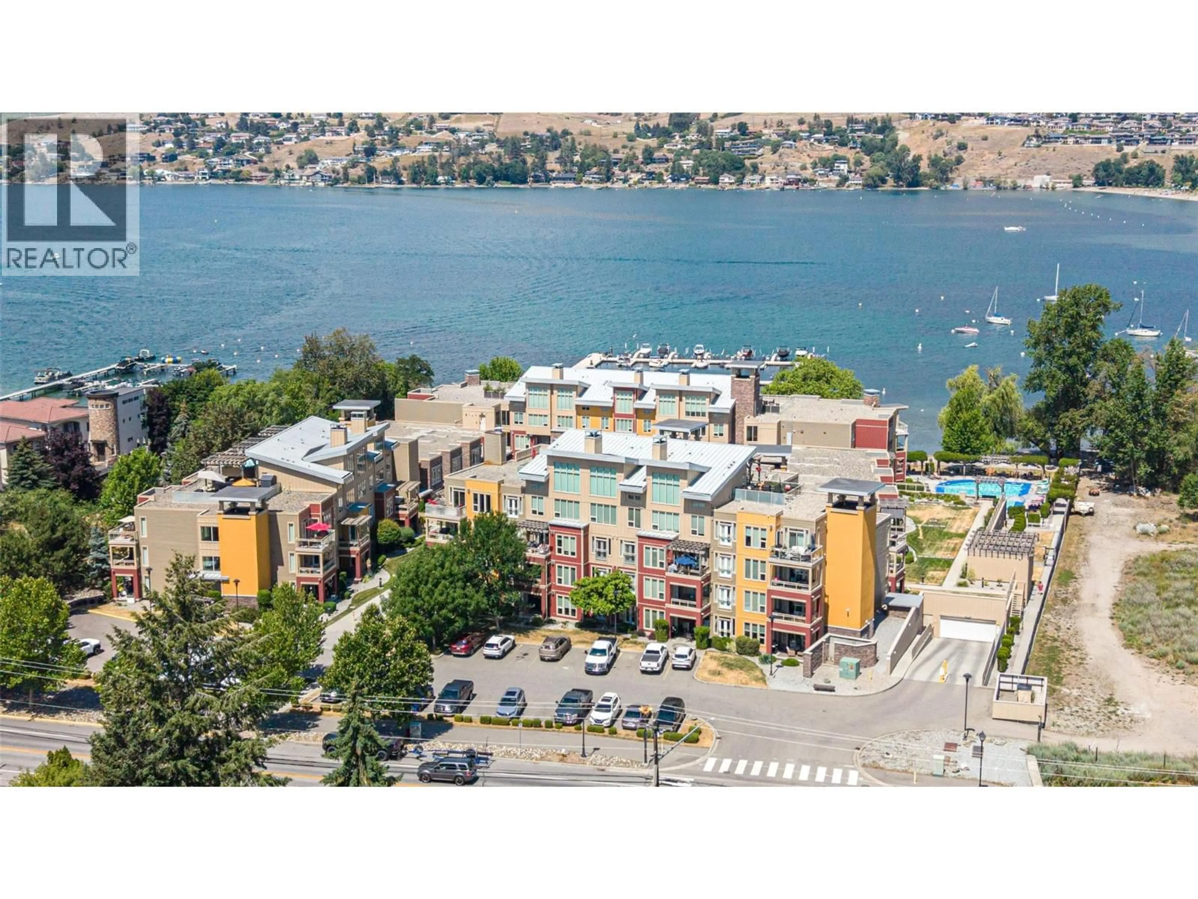 A pic from outside/outdoor area/front of a property/back of a property/a pic from drone, water/lake/river/ocean view for 2105 - 7343 OKANAGAN LANDING ROAD, Vernon British Columbia V1H2J6