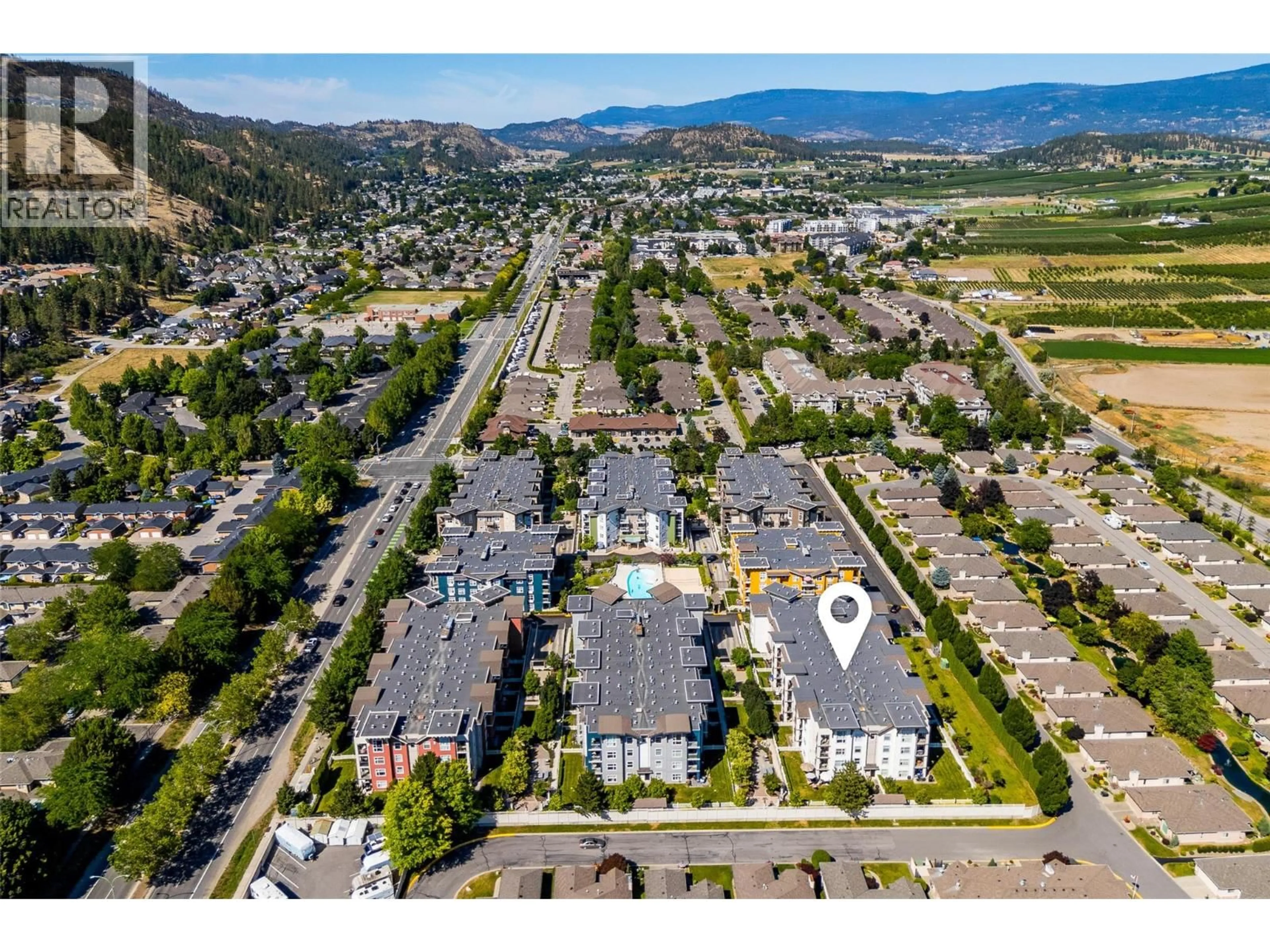A pic from outside/outdoor area/front of a property/back of a property/a pic from drone, mountain view for 307 - 567 YATES ROAD, Kelowna British Columbia V1V2V4