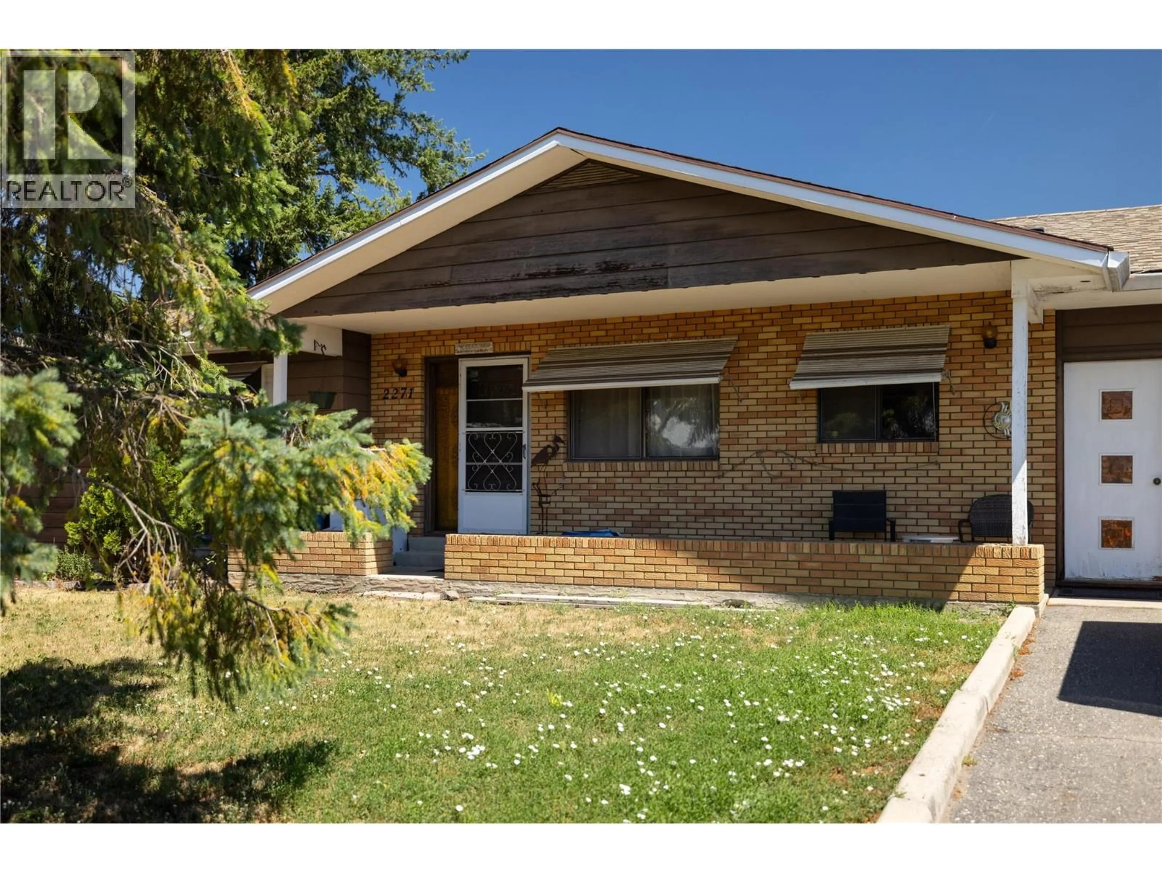 Home with brick exterior material, street for 2271 FRANCIS STREET, Vernon British Columbia V1B3B4