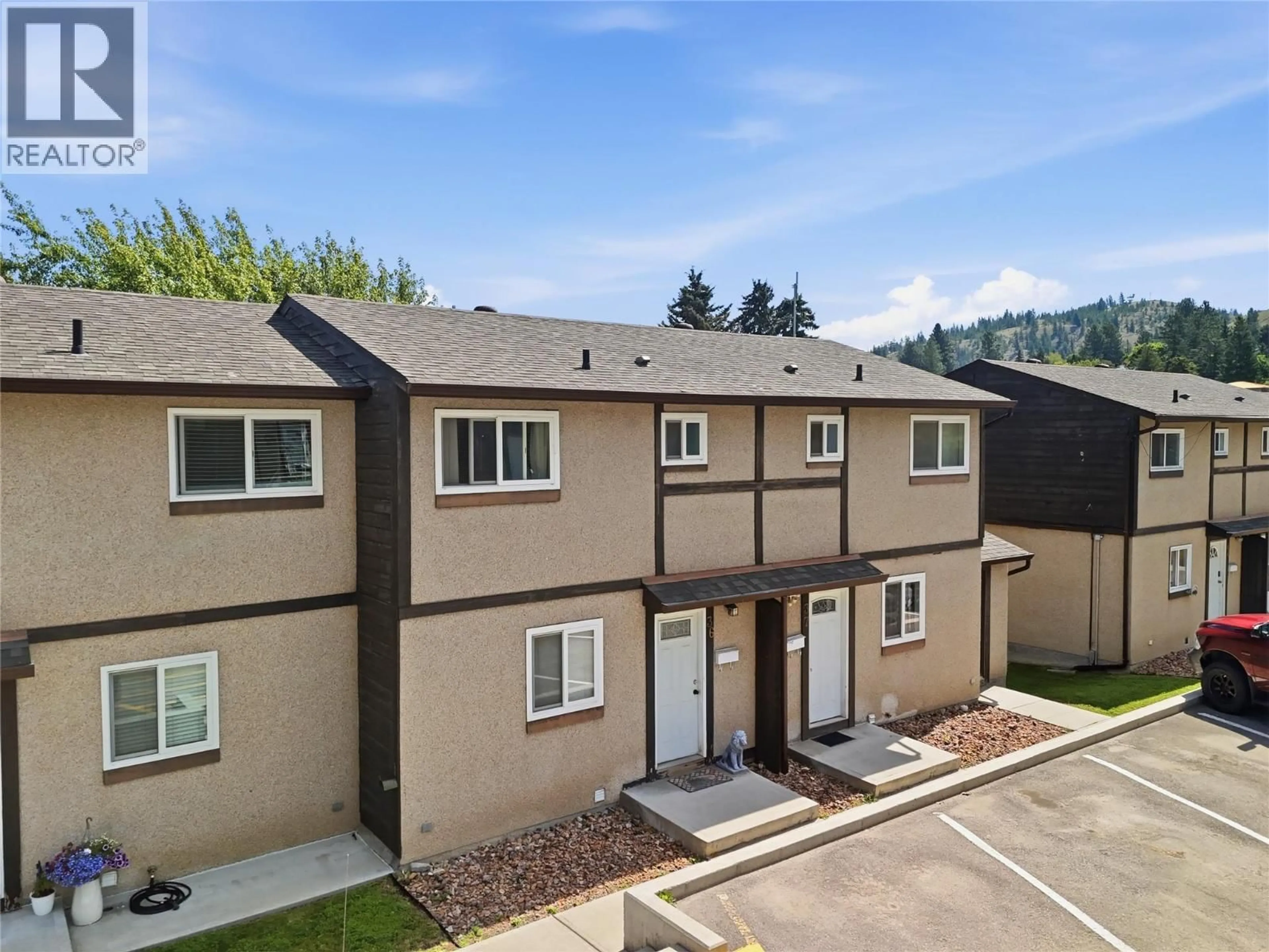 A pic from outside/outdoor area/front of a property/back of a property/a pic from drone, mountain view for 36 - 1605 SUMMIT DRIVE, Kamloops British Columbia V2E2A5