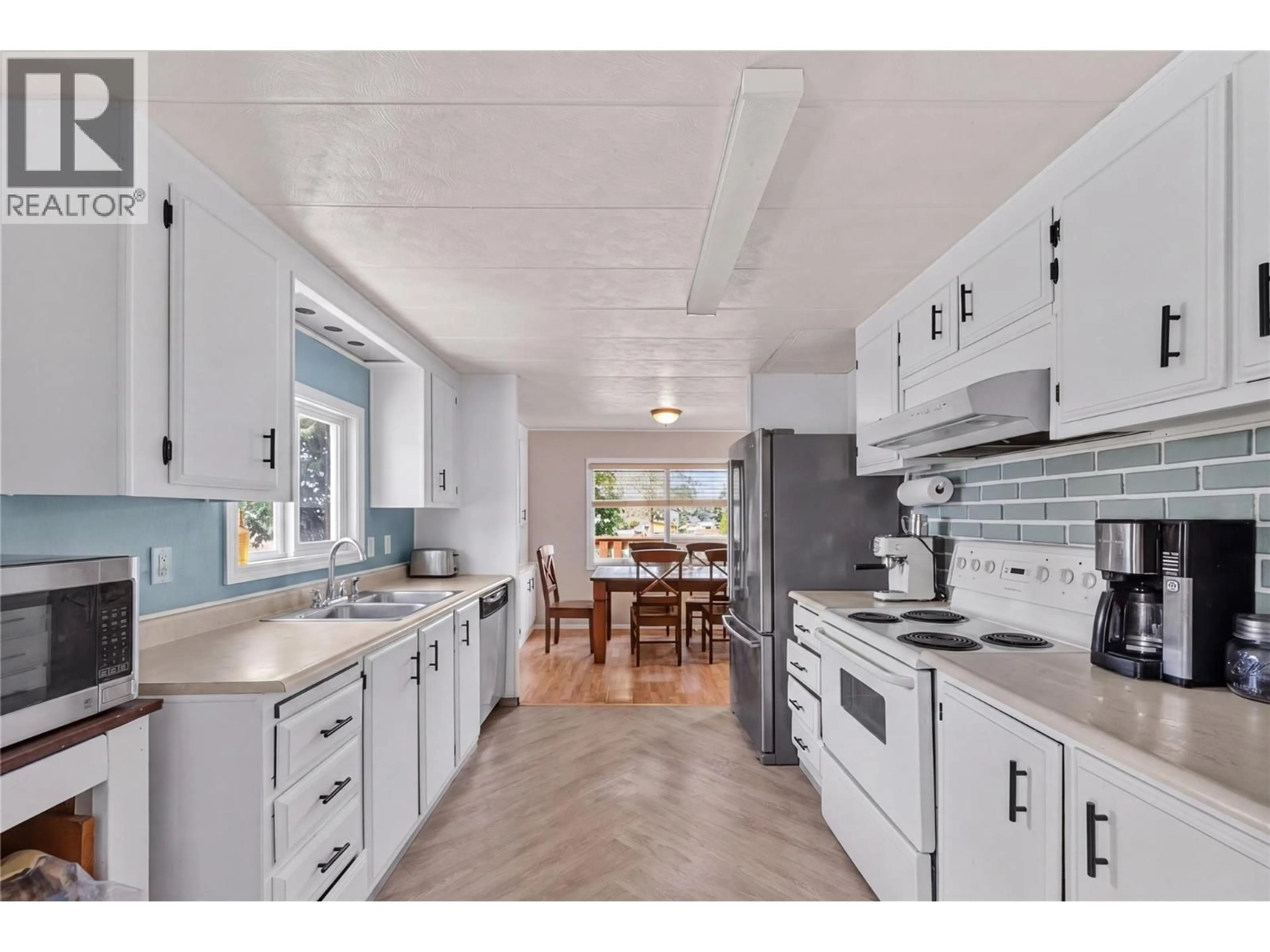 Open concept kitchen, ceramic/tile floor for 2588 KINVIG STREET, Merritt British Columbia V0K1Y0