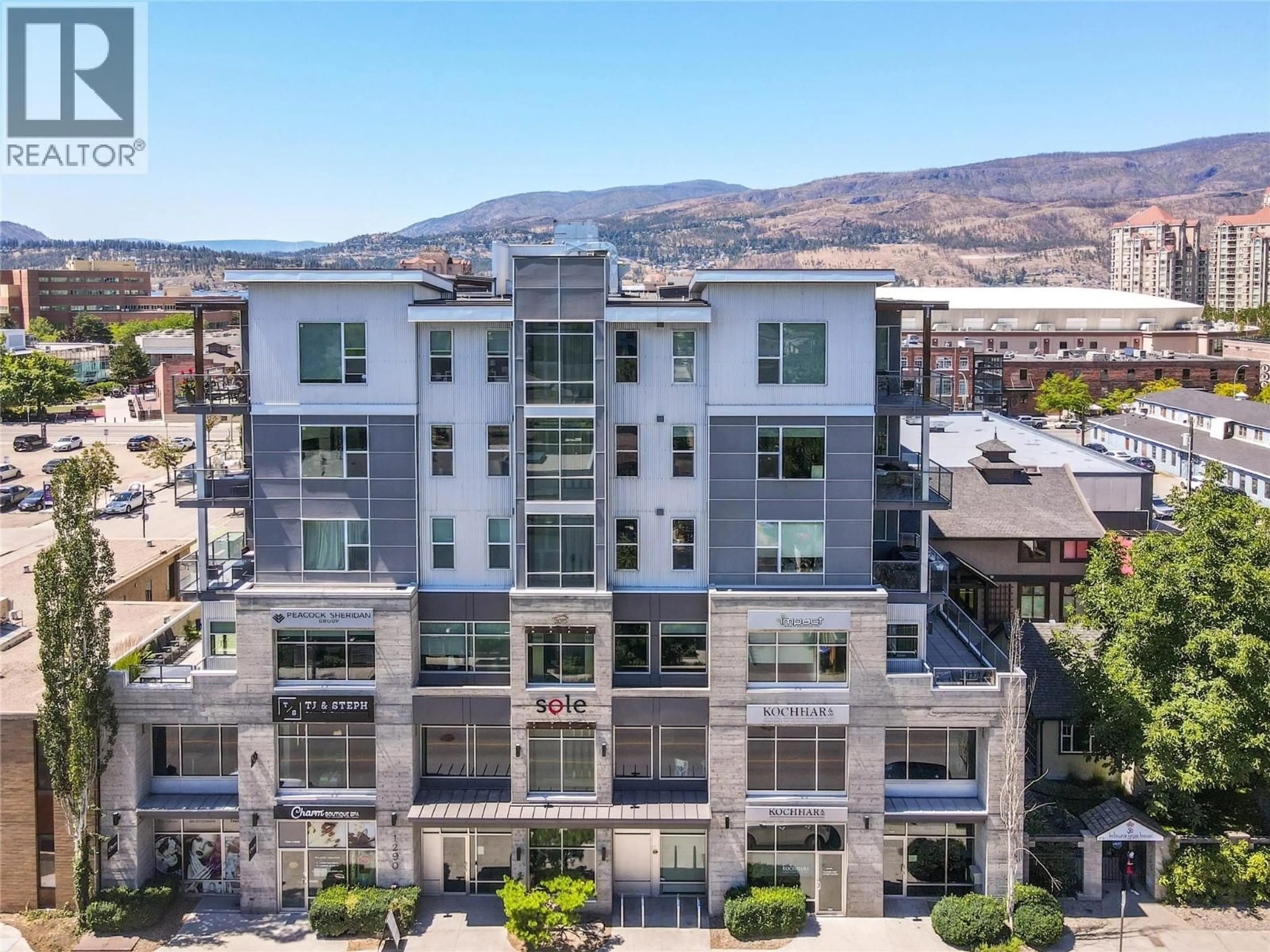 A pic from outside/outdoor area/front of a property/back of a property/a pic from drone, mountain view for 406 - 1290 ST. PAUL STREET, Kelowna British Columbia V1Y2C9