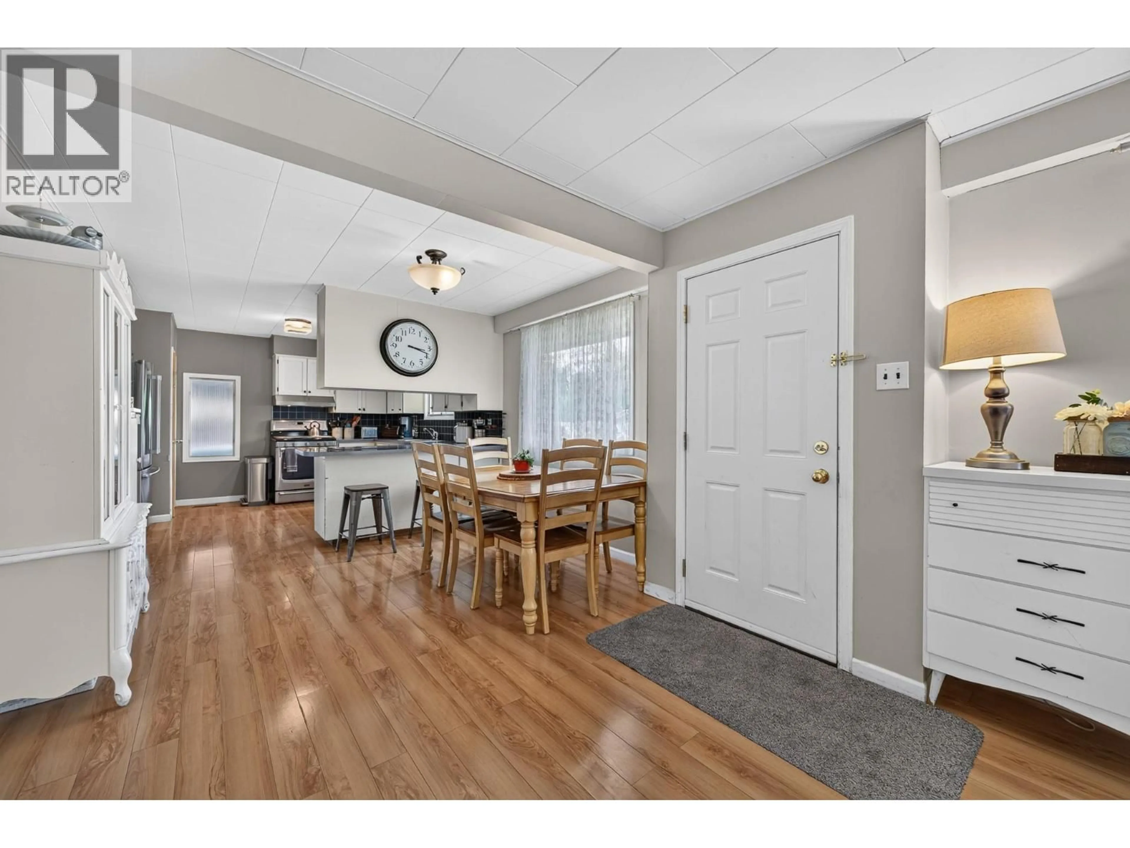 Open concept kitchen, wood/laminate floor for 229 NELSON AVENUE, Kamloops British Columbia V2B1M4