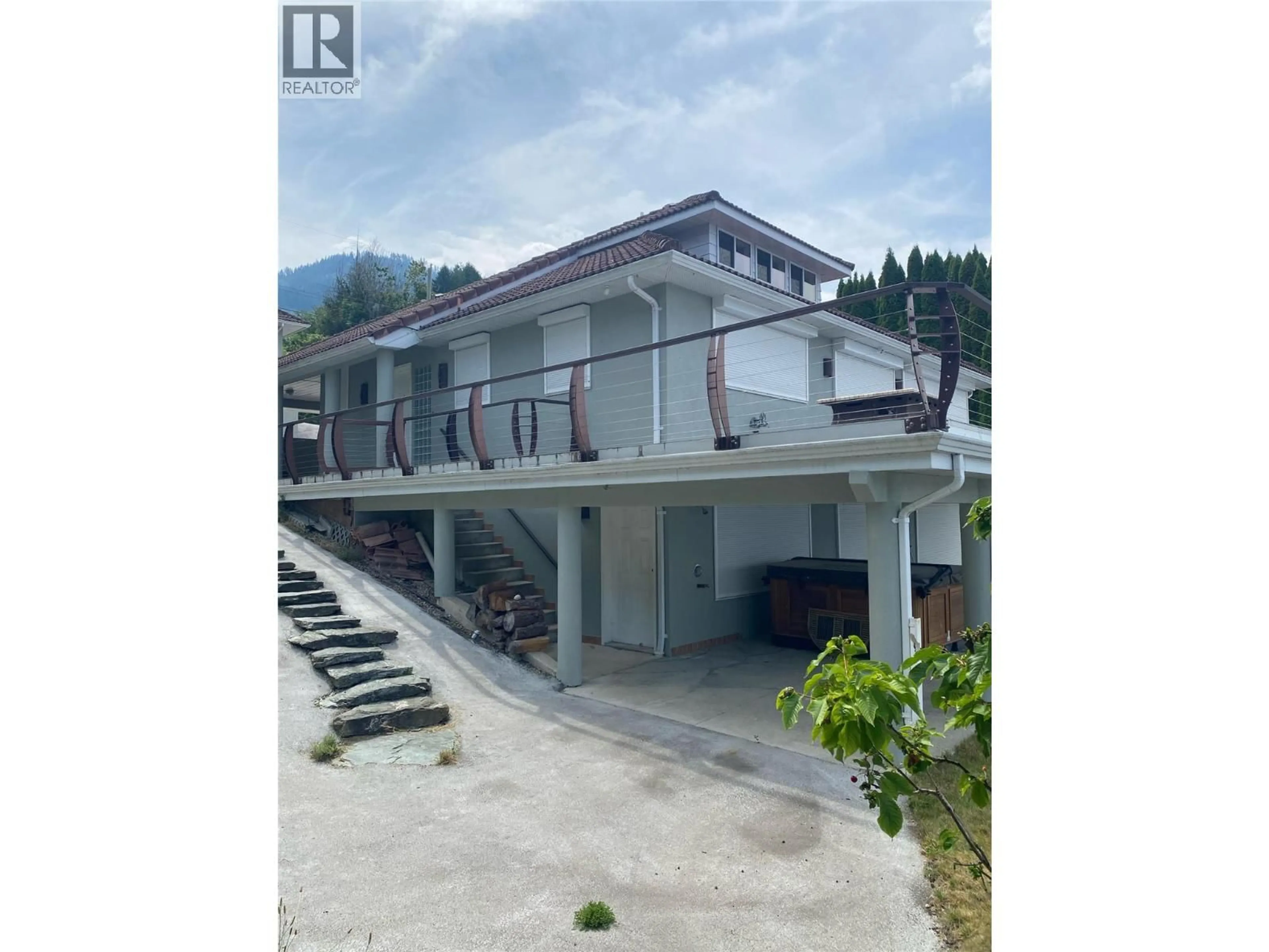 A pic from outside/outdoor area/front of a property/back of a property/a pic from drone, unknown for 4071 REID ROAD, Eagle Bay British Columbia V0E1T0