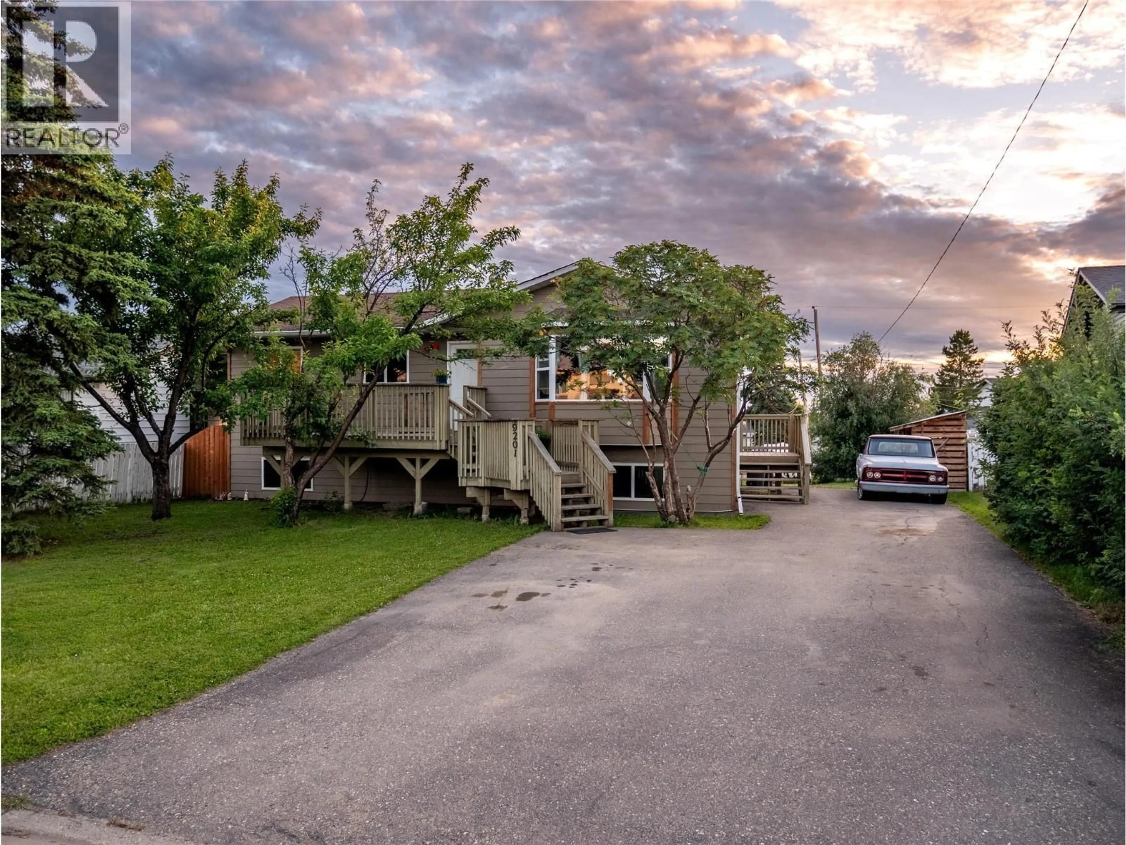 A pic from outside/outdoor area/front of a property/back of a property/a pic from drone, street for 9201 6 STREET, Dawson Creek British Columbia V1G3L5