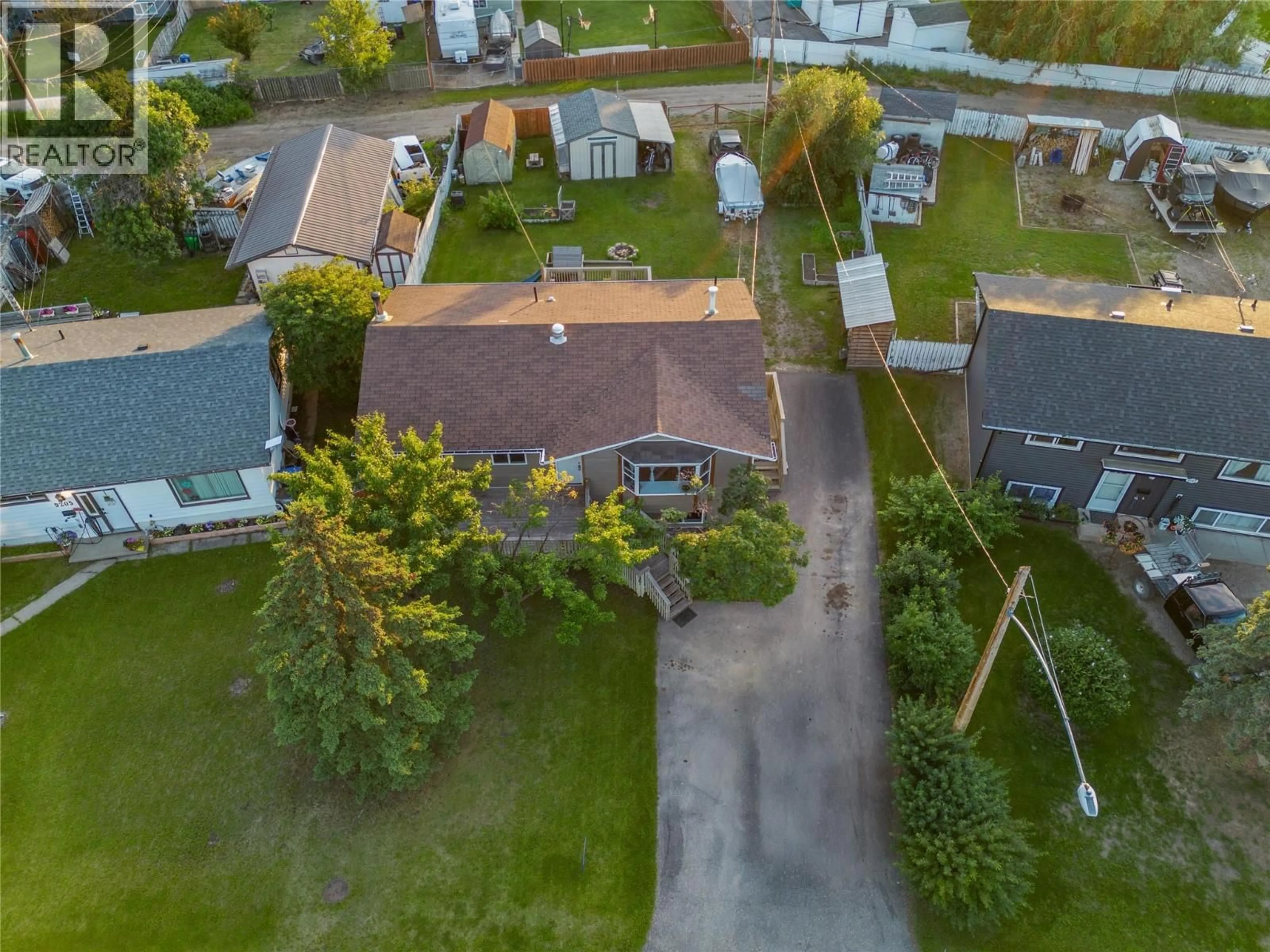 A pic from outside/outdoor area/front of a property/back of a property/a pic from drone, street for 9201 6 STREET, Dawson Creek British Columbia V1G3L5