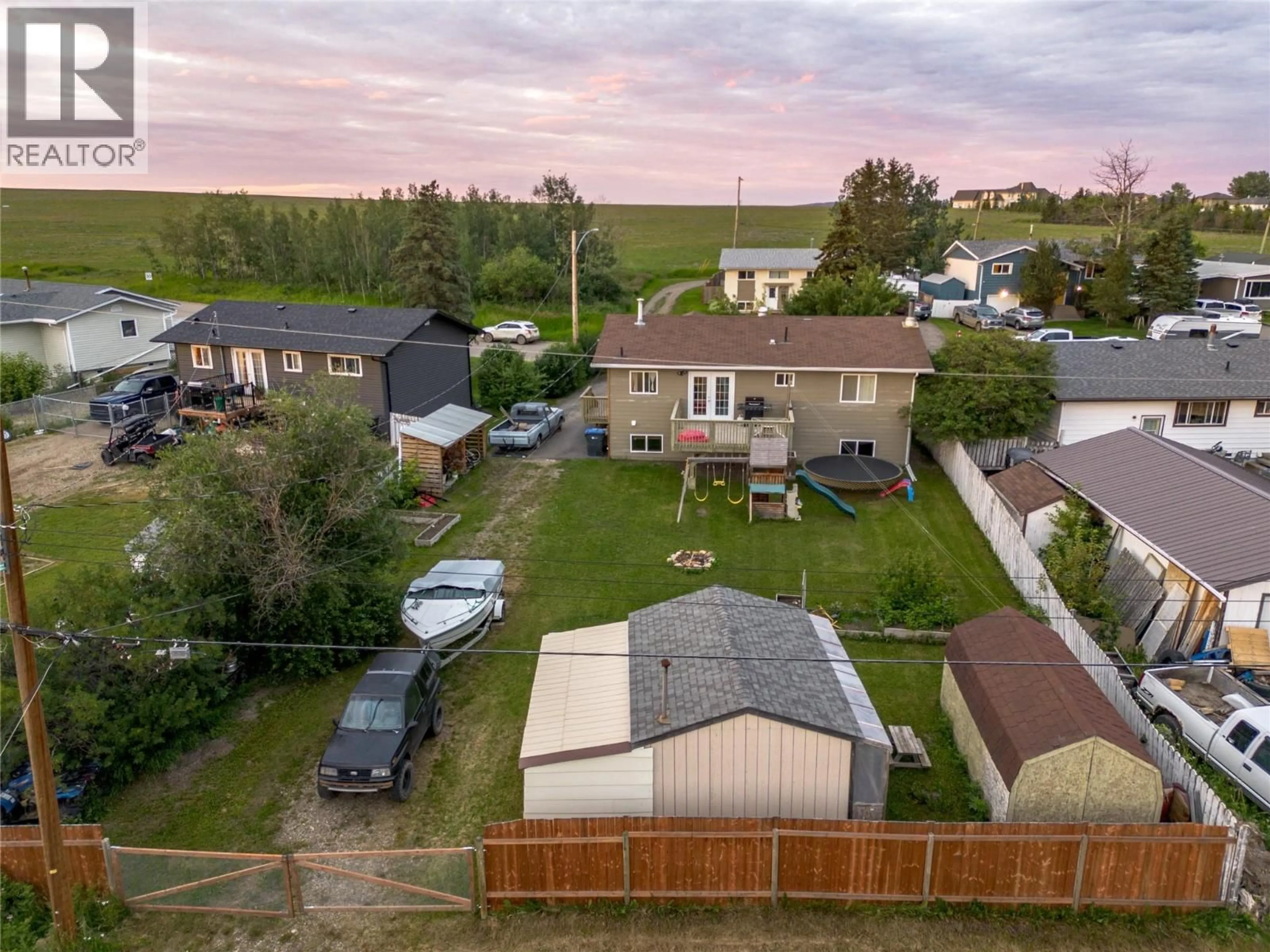 A pic from outside/outdoor area/front of a property/back of a property/a pic from drone, street for 9201 6 STREET, Dawson Creek British Columbia V1G3L5