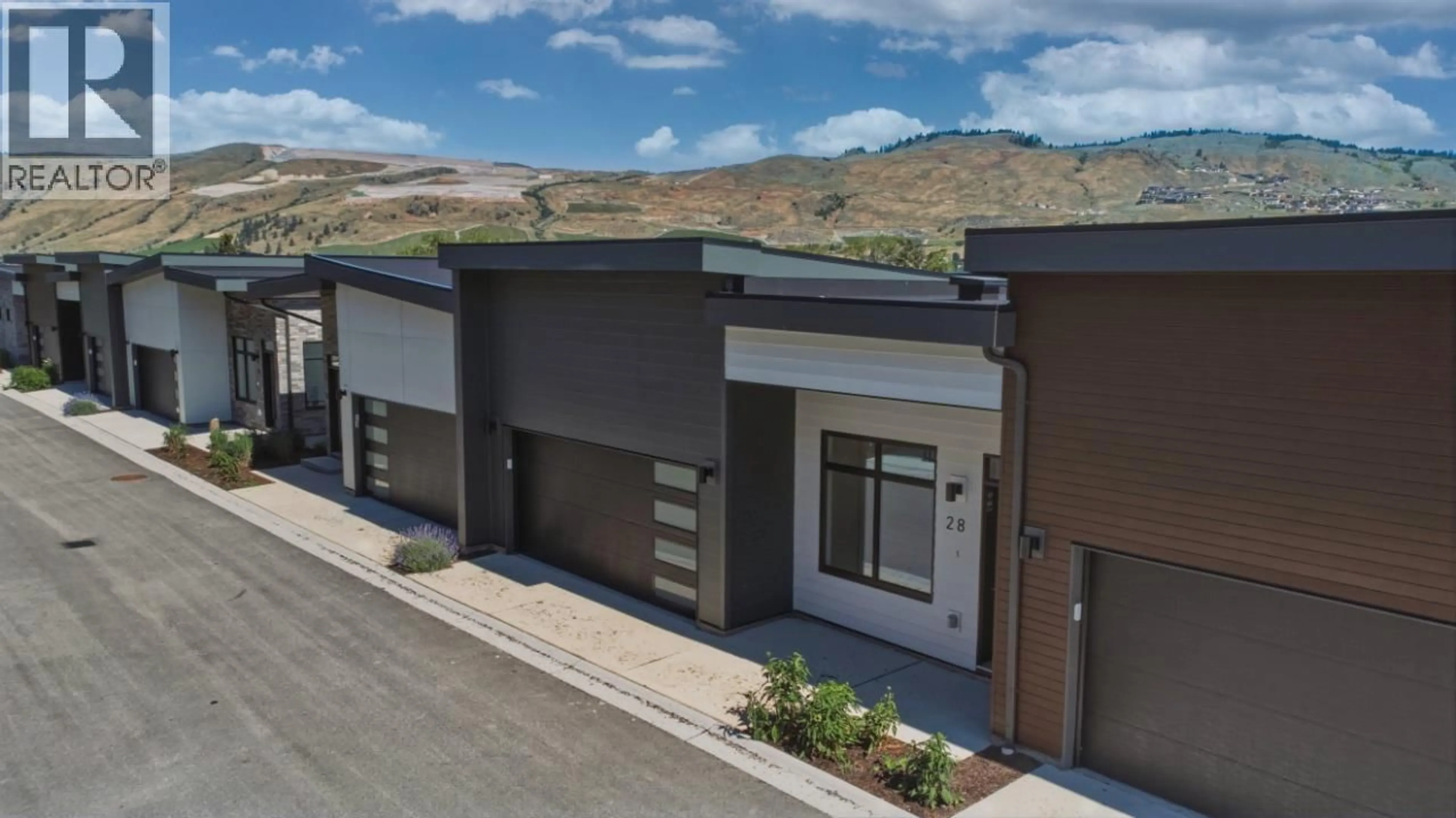 A pic from outside/outdoor area/front of a property/back of a property/a pic from drone, unknown for 28 - 7599 KLINGER ROAD, Okanagan Landing British Columbia V1H0B2