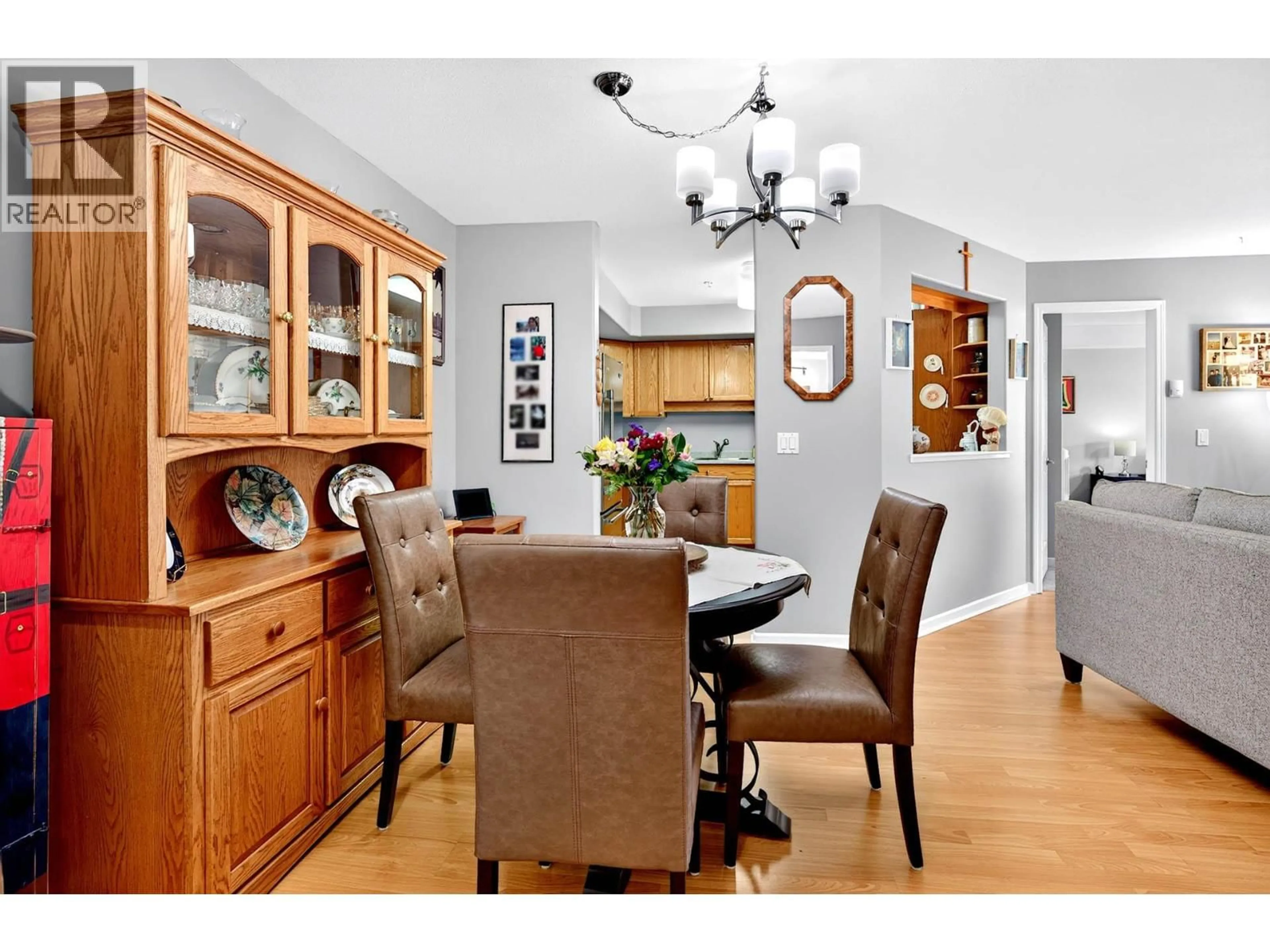 Dining room, wood/laminate floor for 212 - 860 NICOLANI DRIVE, Kamloops British Columbia V2B5B3