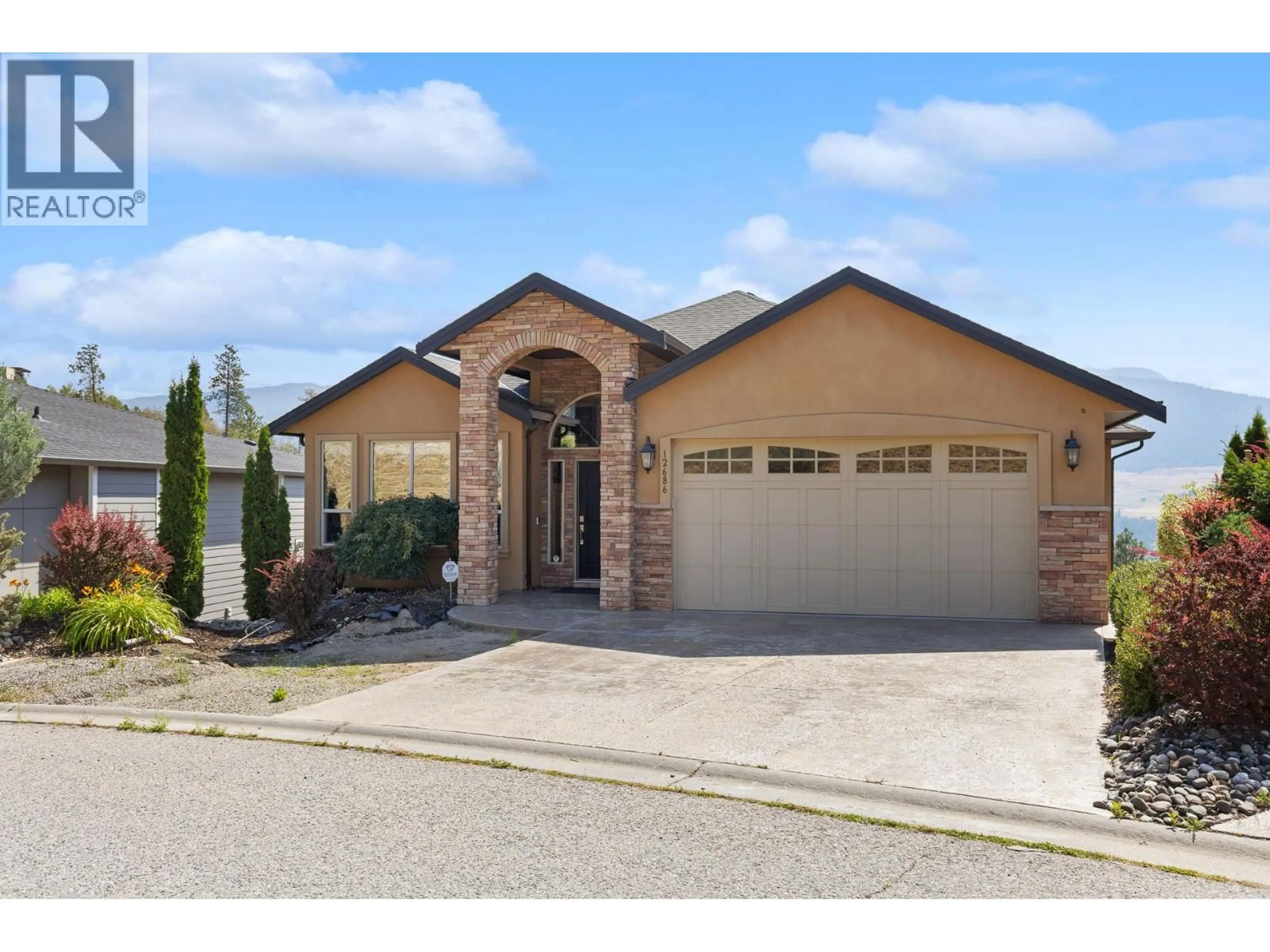 Home with brick exterior material, street for 12686 CLIFFSHORE DRIVE, Lake Country British Columbia V4V2P6
