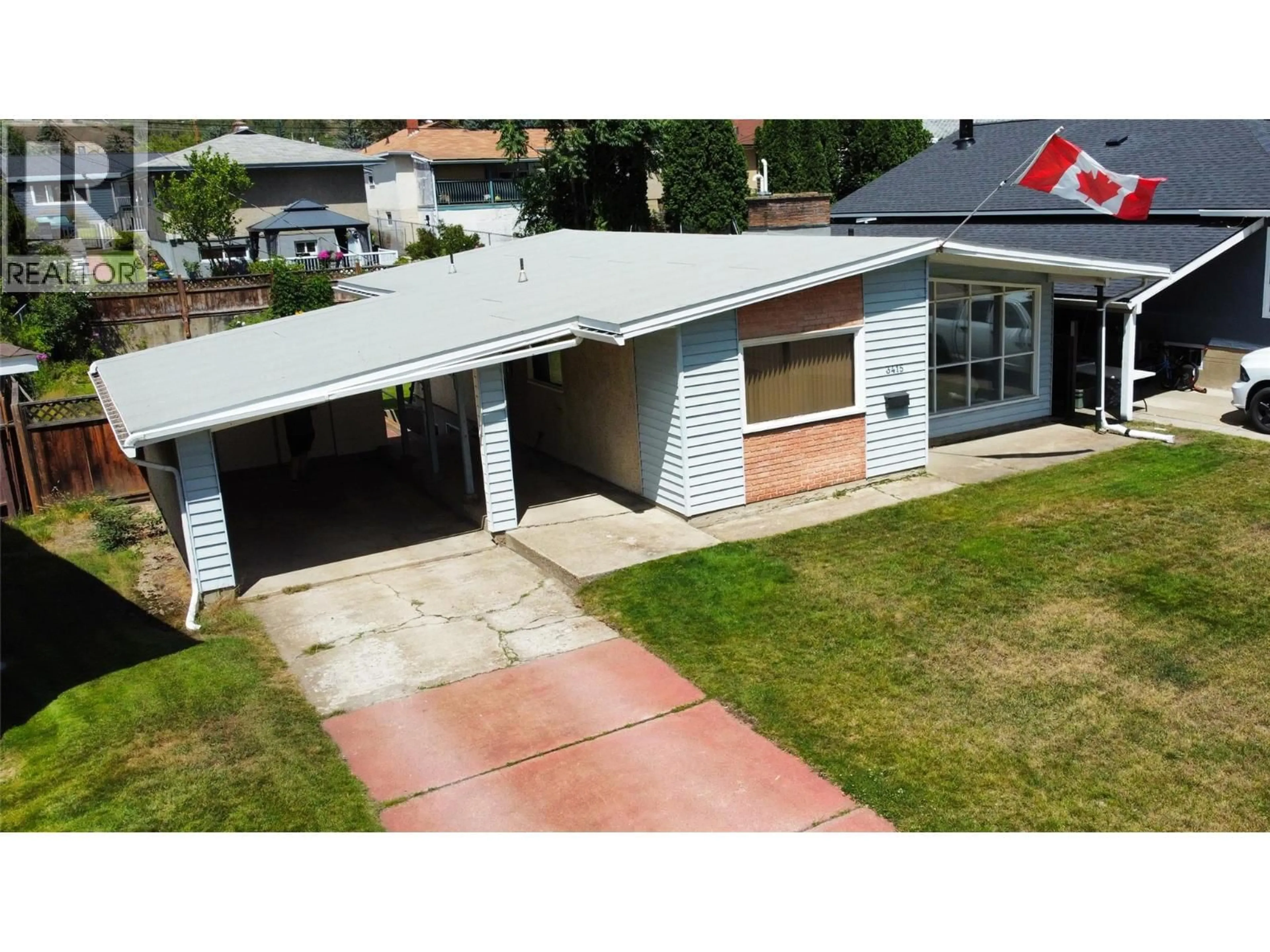 A pic from outside/outdoor area/front of a property/back of a property/a pic from drone, street for 3415 MARIGOLD DRIVE, Trail British Columbia V1R2X7