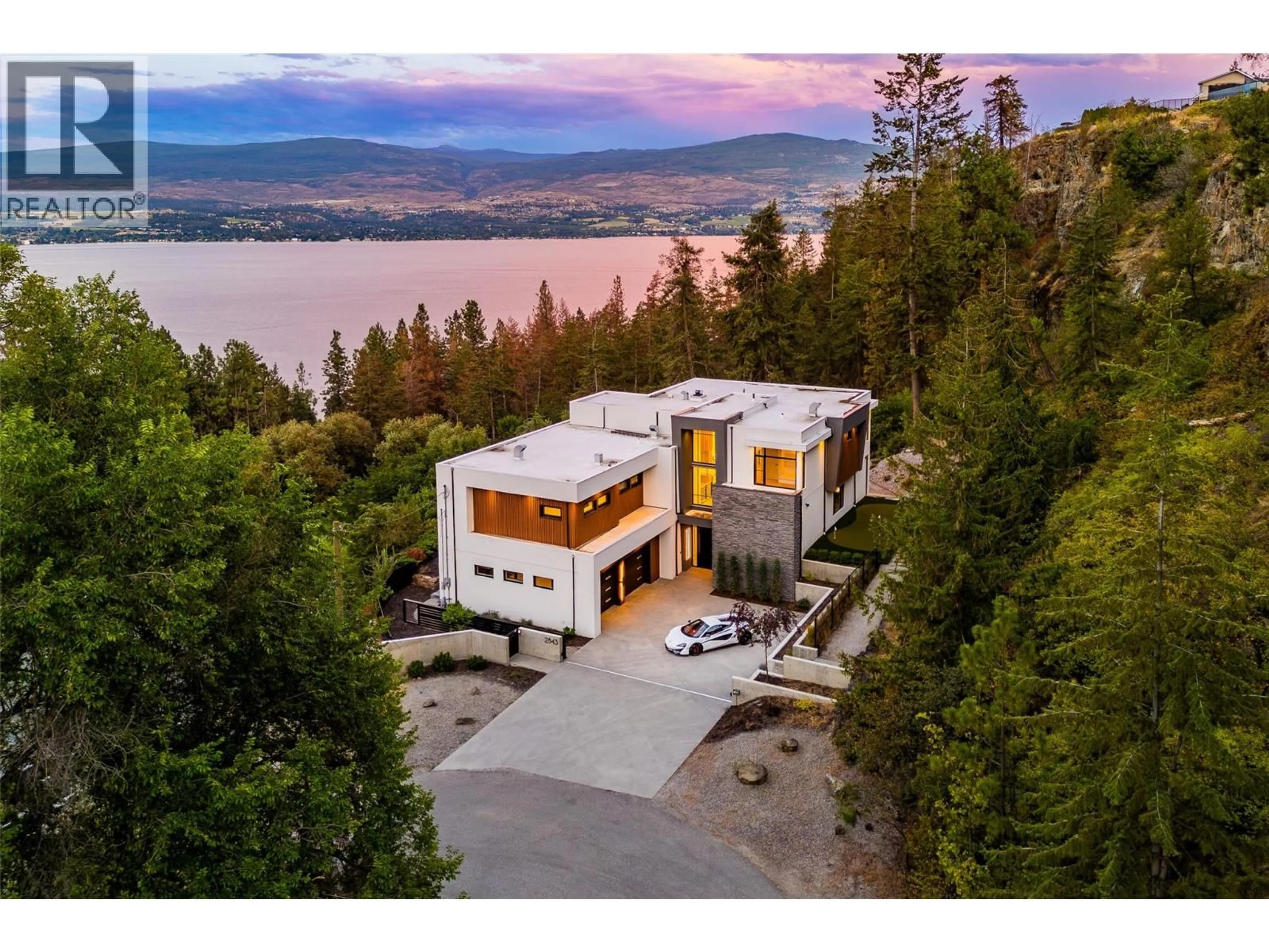 A pic from outside/outdoor area/front of a property/back of a property/a pic from drone, water/lake/river/ocean view for 2843 LAKERIDGE ROAD, West Kelowna British Columbia V1Z1Y1