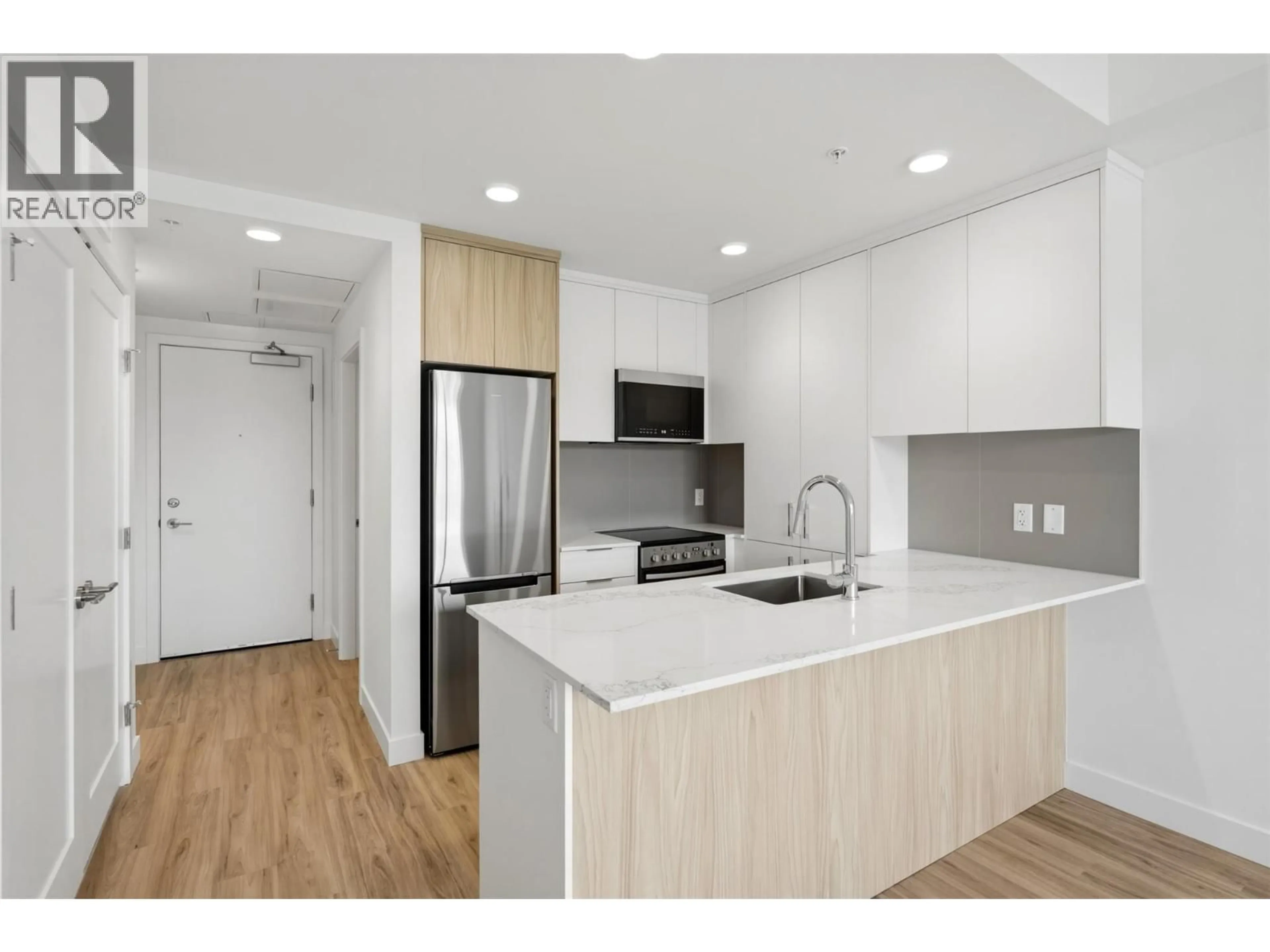 Standard kitchen, wood/laminate floor for 507 - 271 WYLIE STREET, Penticton British Columbia V2A0L3