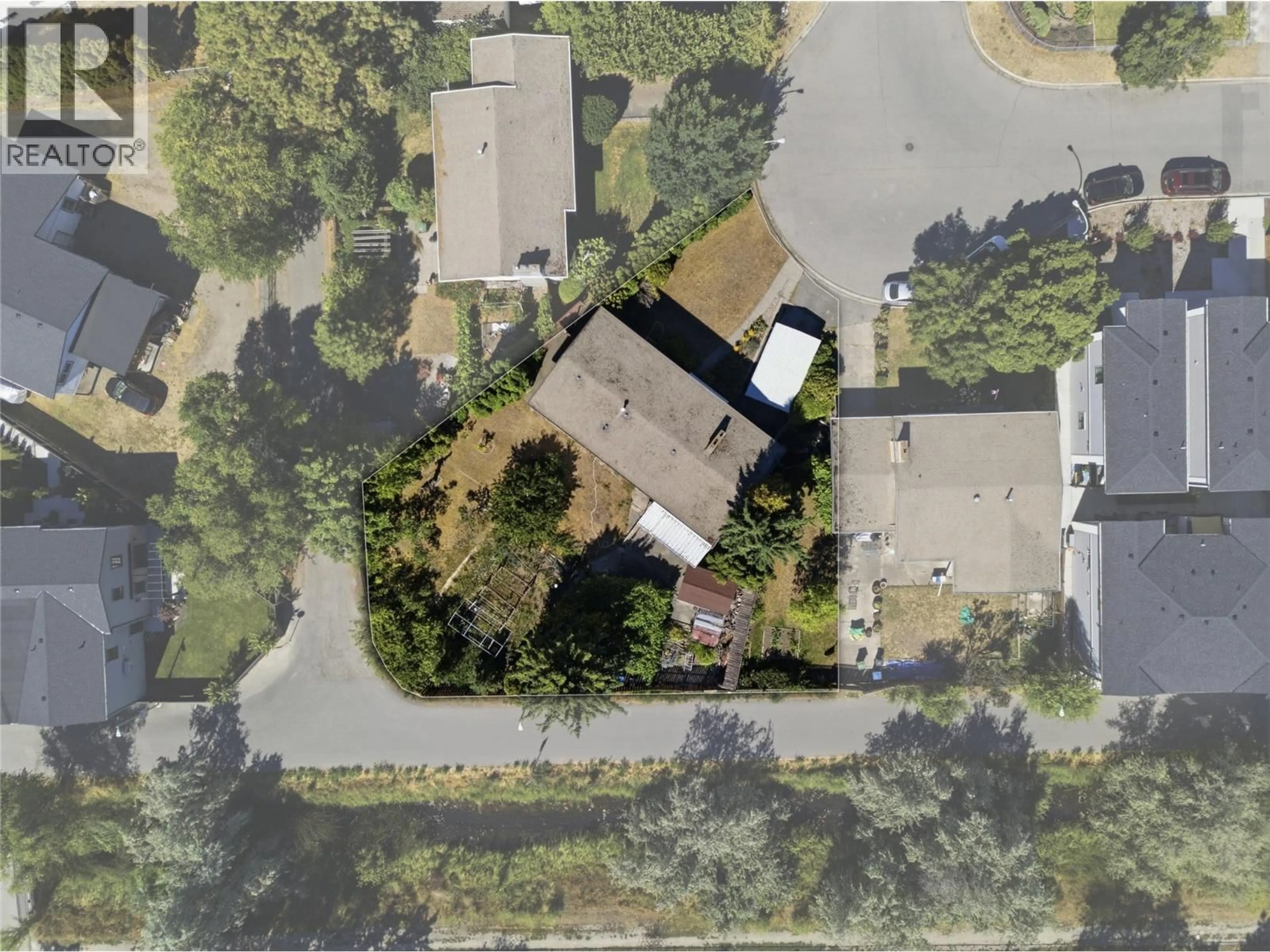A pic from outside/outdoor area/front of a property/back of a property/a pic from drone, street for 766 COOPLAND CRESCENT, Kelowna British Columbia V1Y2V1