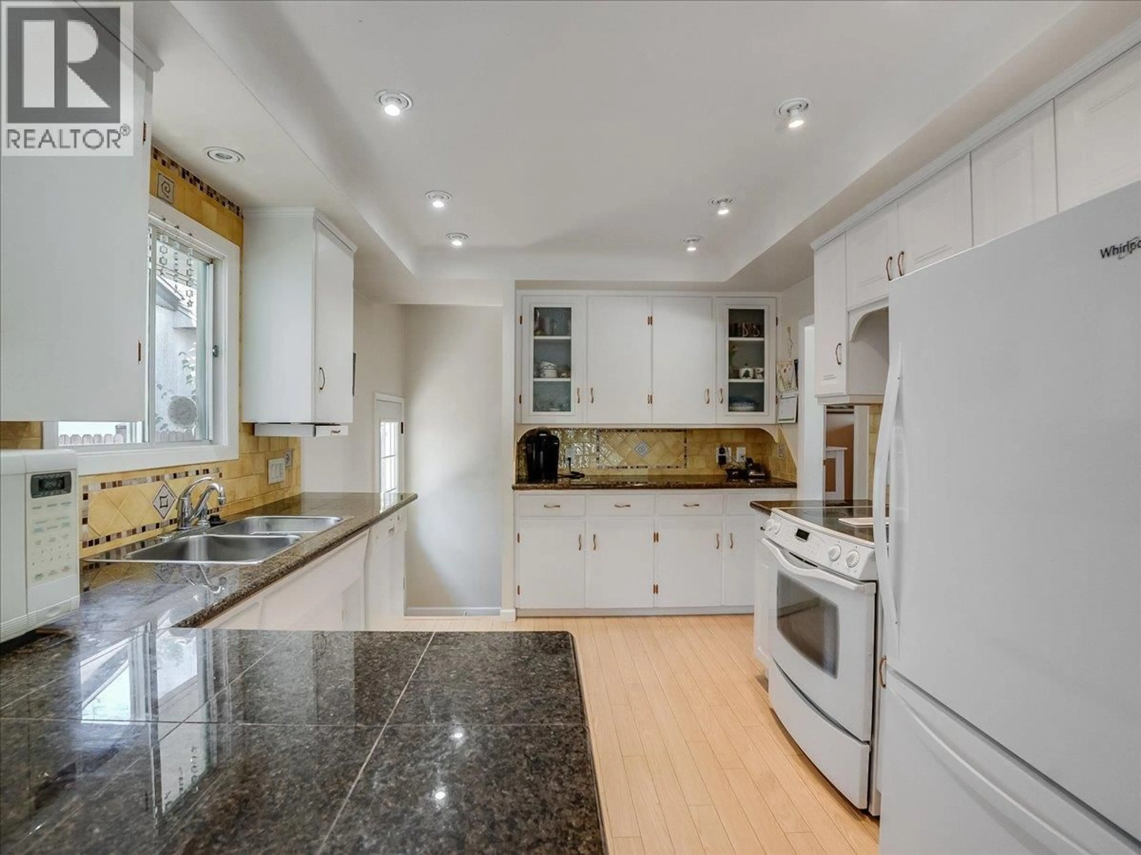 Open concept kitchen, ceramic/tile floor for 635 JACOBS STREET, Warfield British Columbia V1R2C9