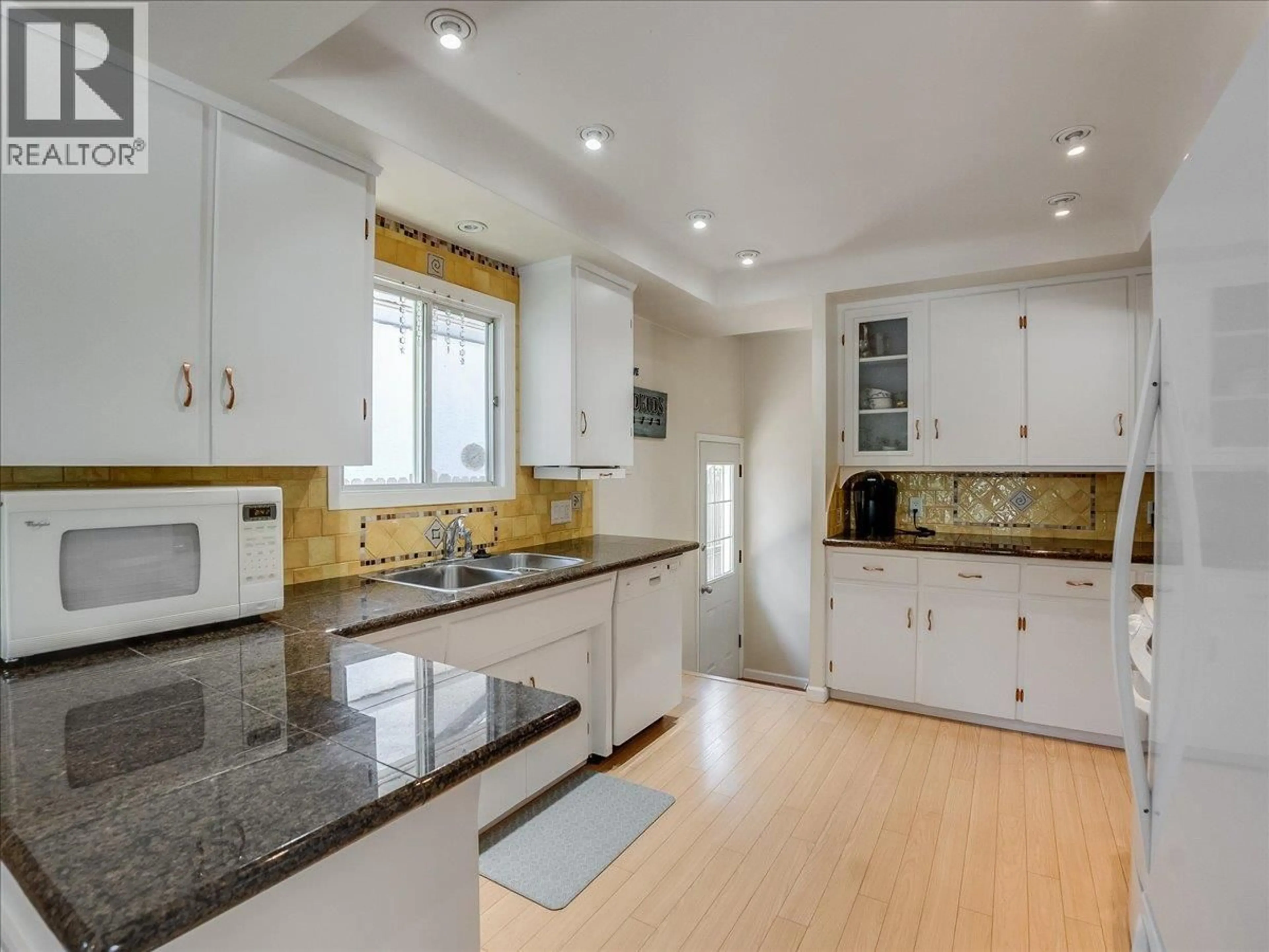 Open concept kitchen, ceramic/tile floor for 635 JACOBS STREET, Warfield British Columbia V1R2C9