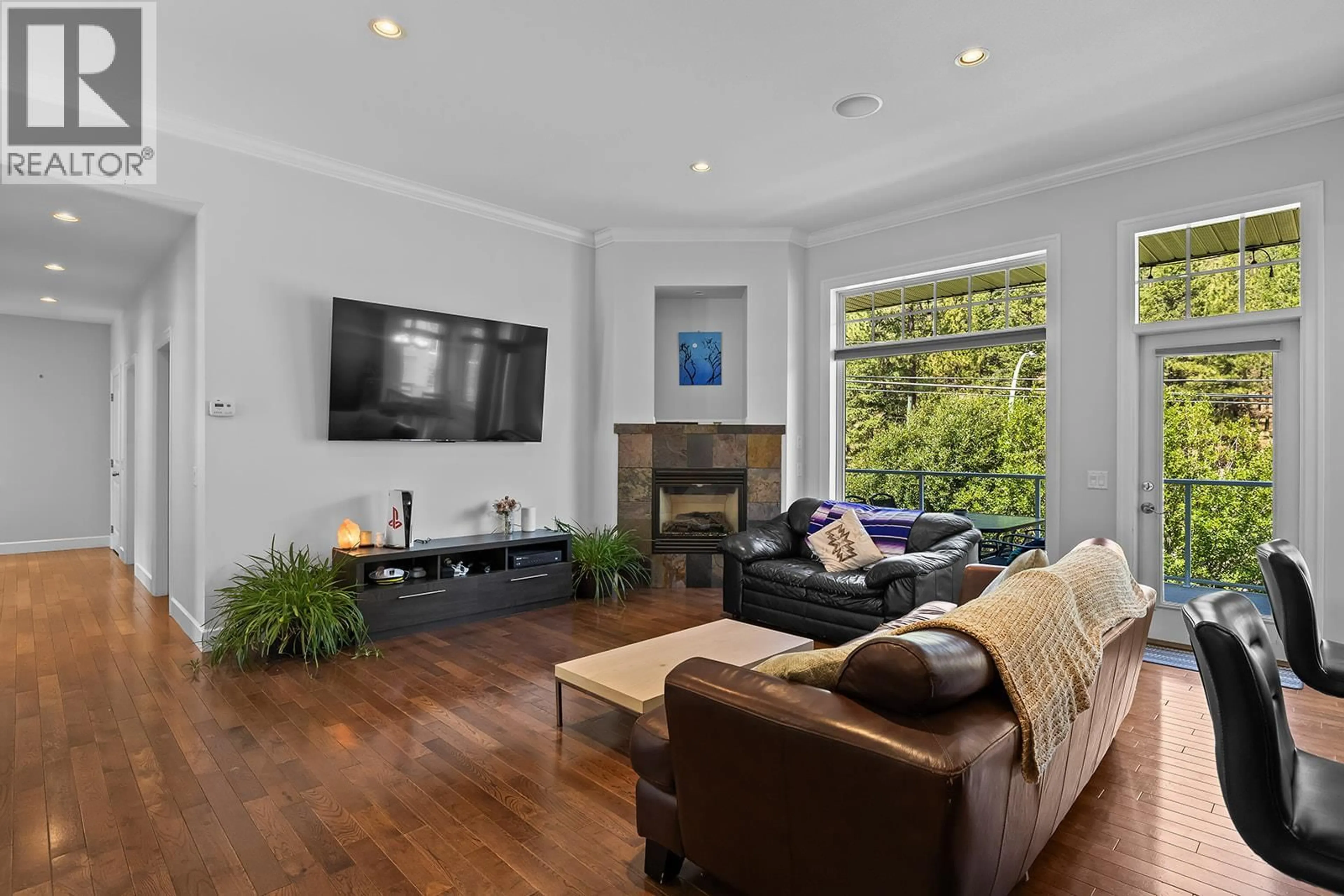 Living room with furniture, wood/laminate floor for 1839 PEAK POINT COURT, West Kelowna British Columbia V1Z4B4