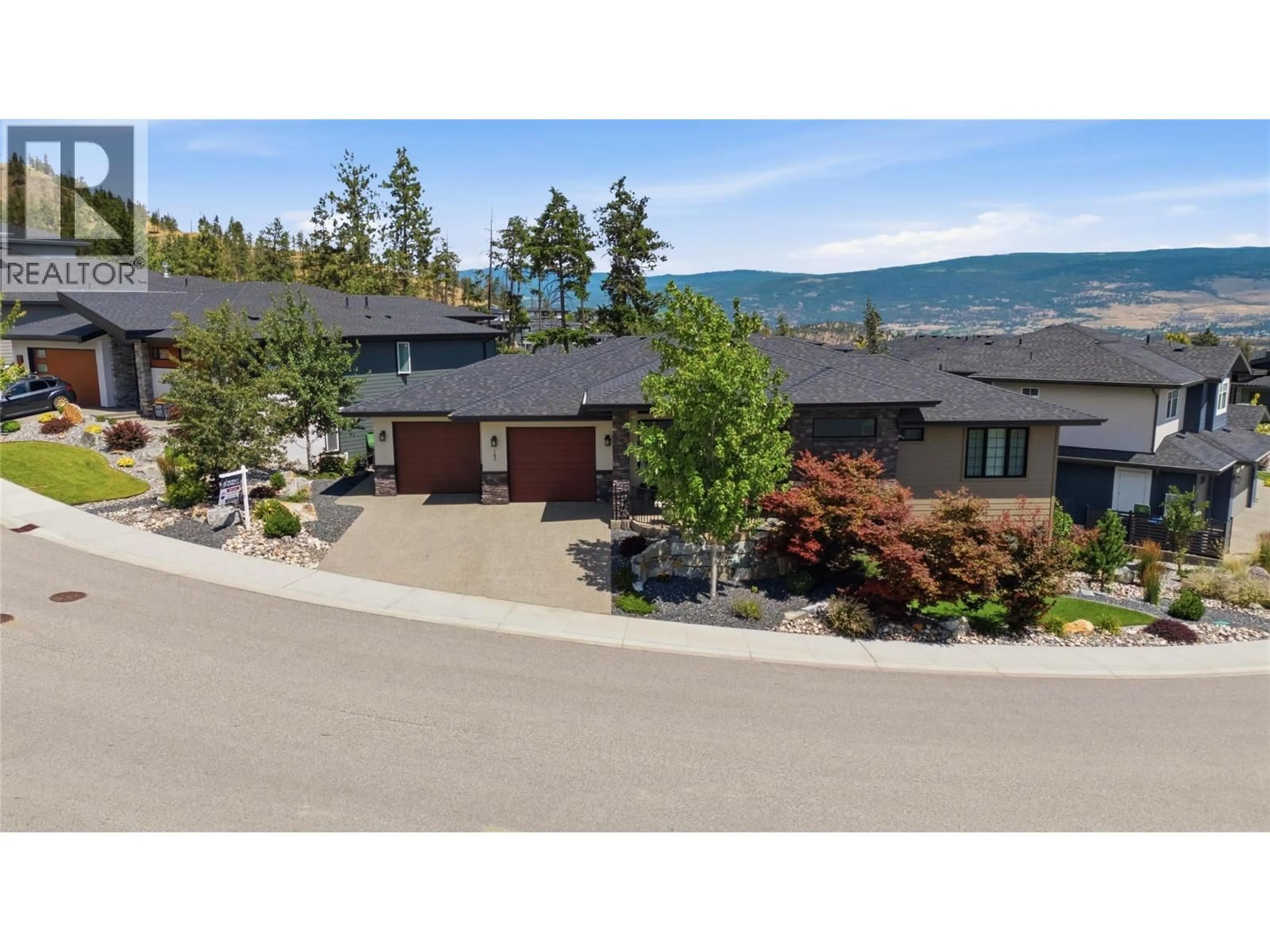 A pic from outside/outdoor area/front of a property/back of a property/a pic from drone, mountain view for 165 SUMMER WOOD DRIVE, Kelowna British Columbia V1V0C9