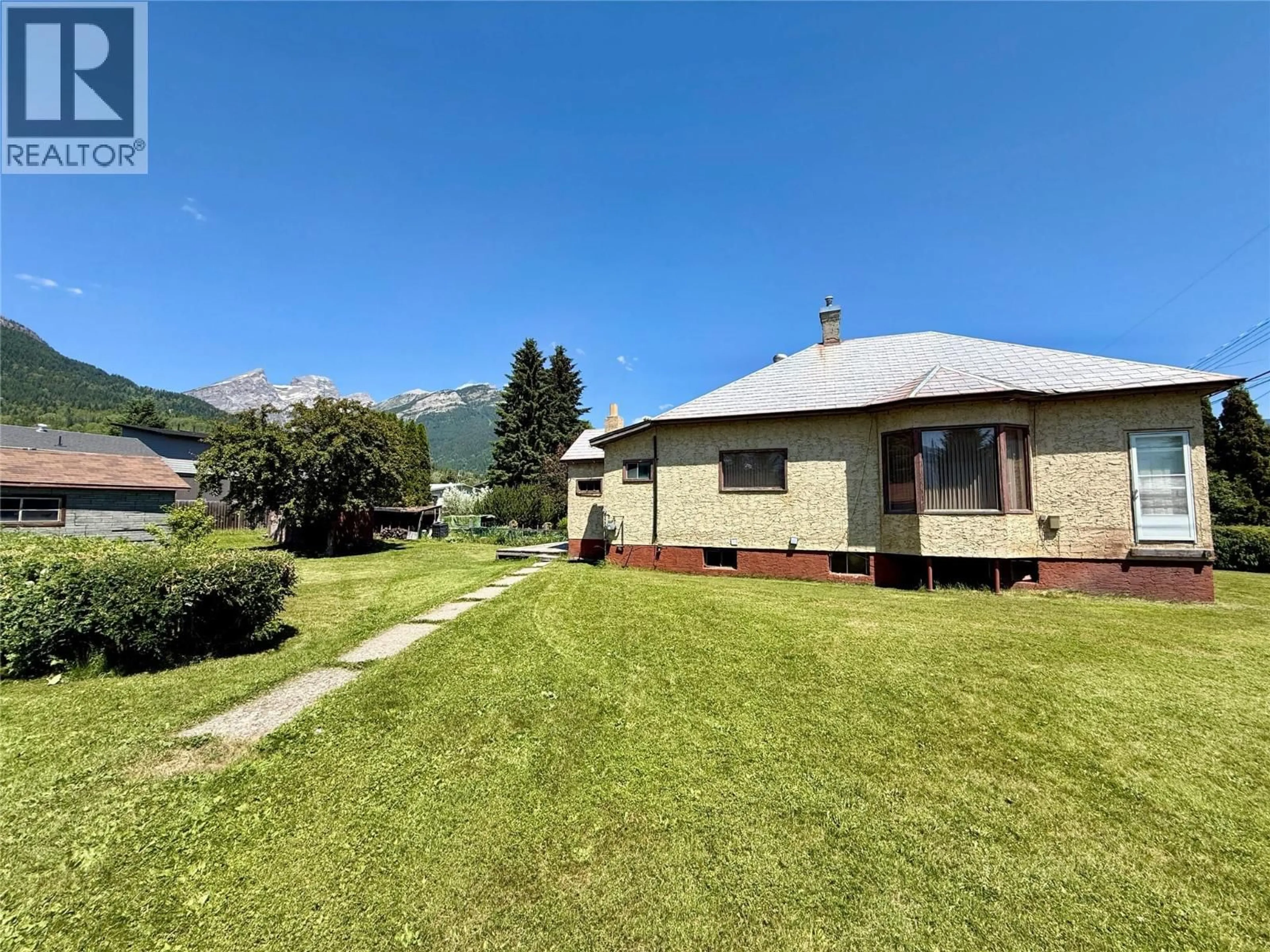 A pic from outside/outdoor area/front of a property/back of a property/a pic from drone, mountain view for 1101 9TH AVENUE, Fernie British Columbia V0B1M0
