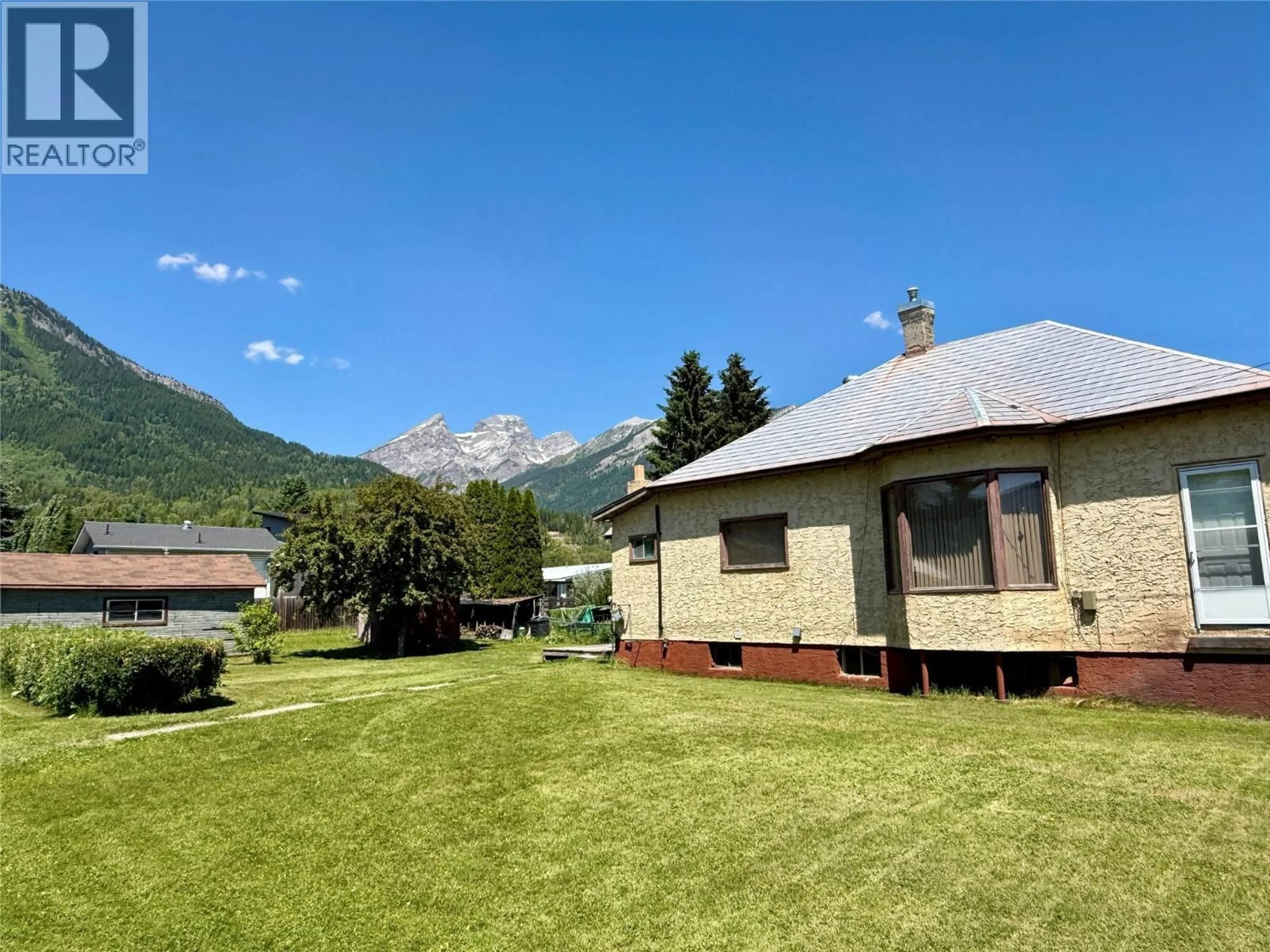 A pic from outside/outdoor area/front of a property/back of a property/a pic from drone, mountain view for 1101 9TH AVENUE, Fernie British Columbia V0B1M0
