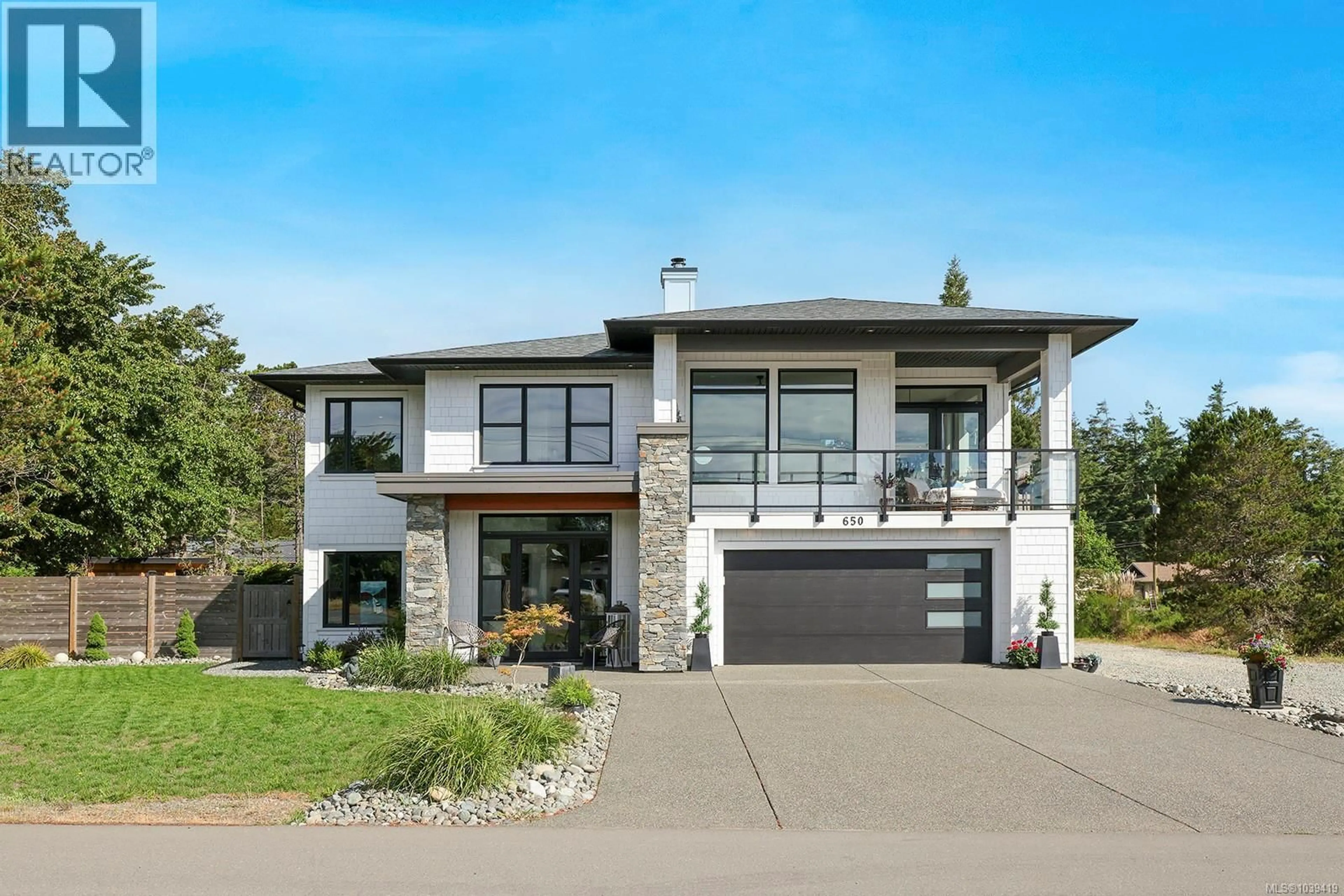 Home with brick exterior material, street for 650 LAZO ROAD, Comox British Columbia V9M3V4
