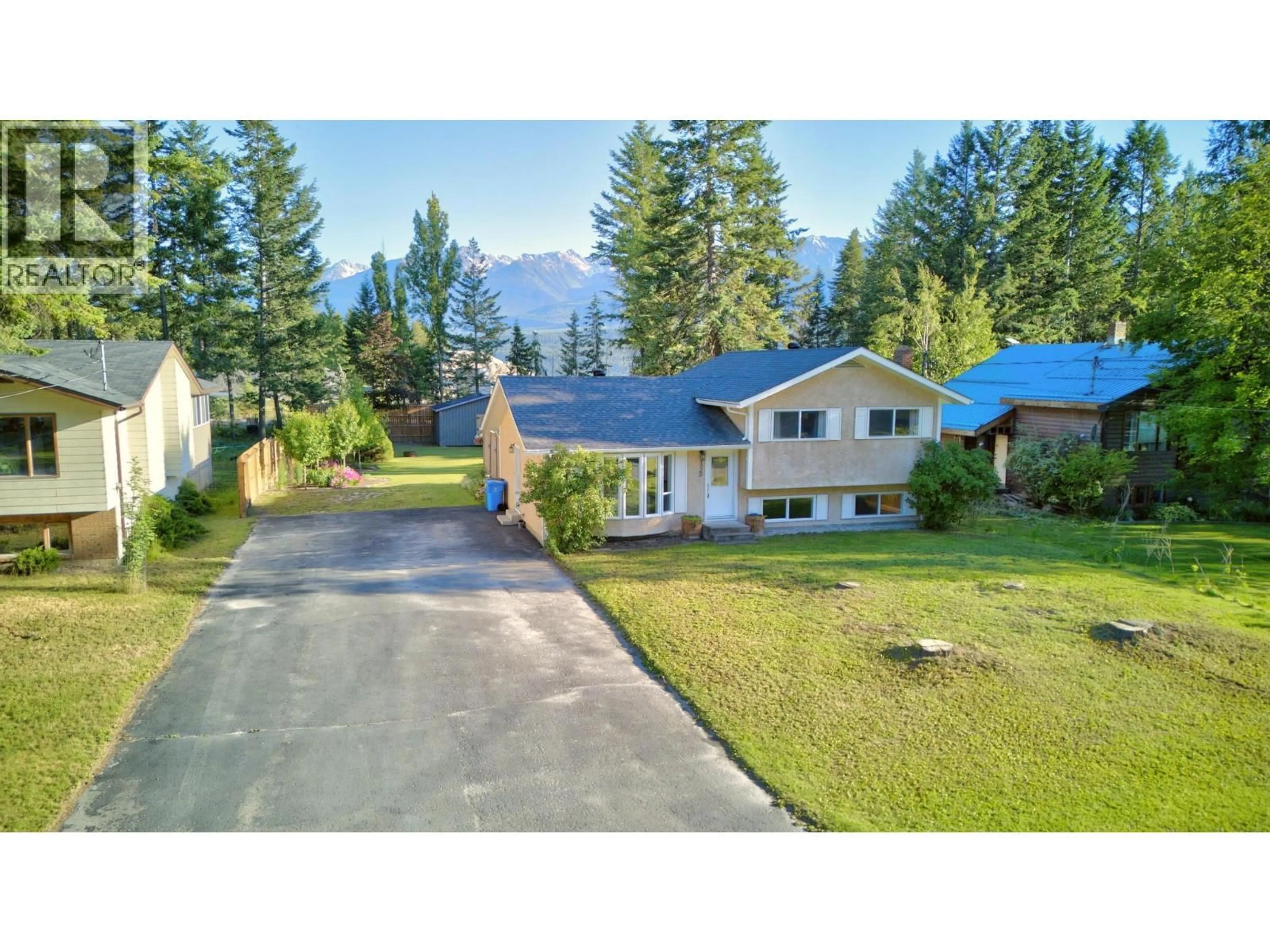 A pic from outside/outdoor area/front of a property/back of a property/a pic from drone, mountain view for 1325 PINE DRIVE, Golden British Columbia V0A1H1