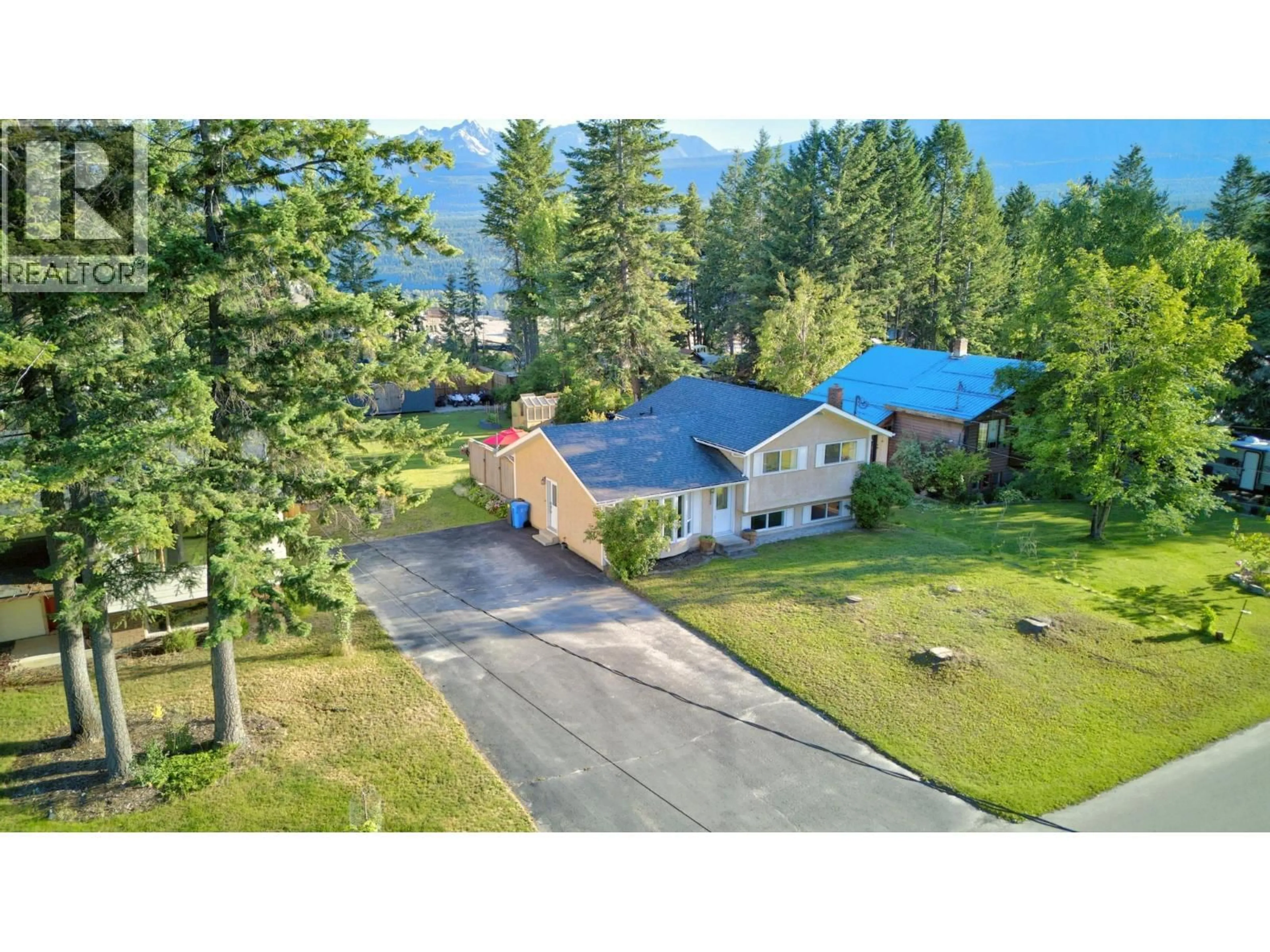 A pic from outside/outdoor area/front of a property/back of a property/a pic from drone, mountain view for 1325 PINE DRIVE, Golden British Columbia V0A1H1