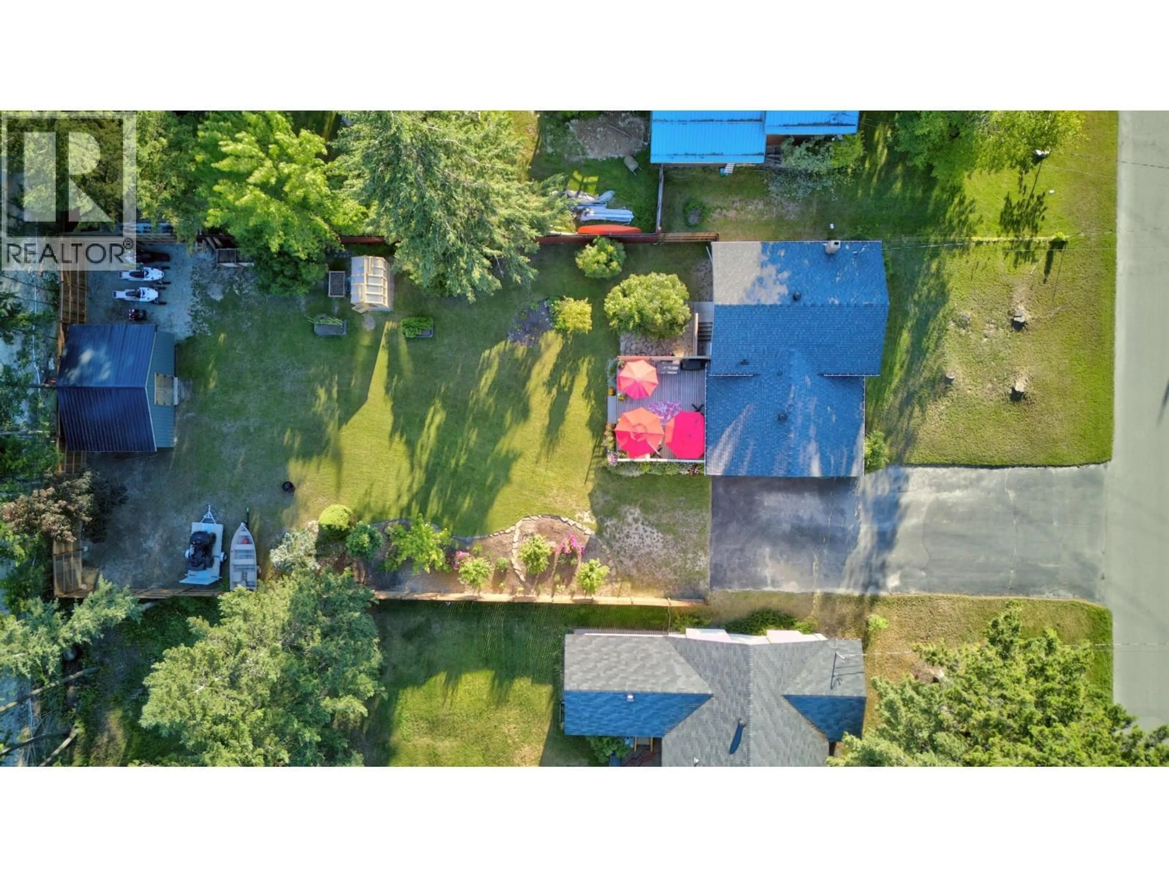 A pic from outside/outdoor area/front of a property/back of a property/a pic from drone, street for 1325 PINE DRIVE, Golden British Columbia V0A1H1