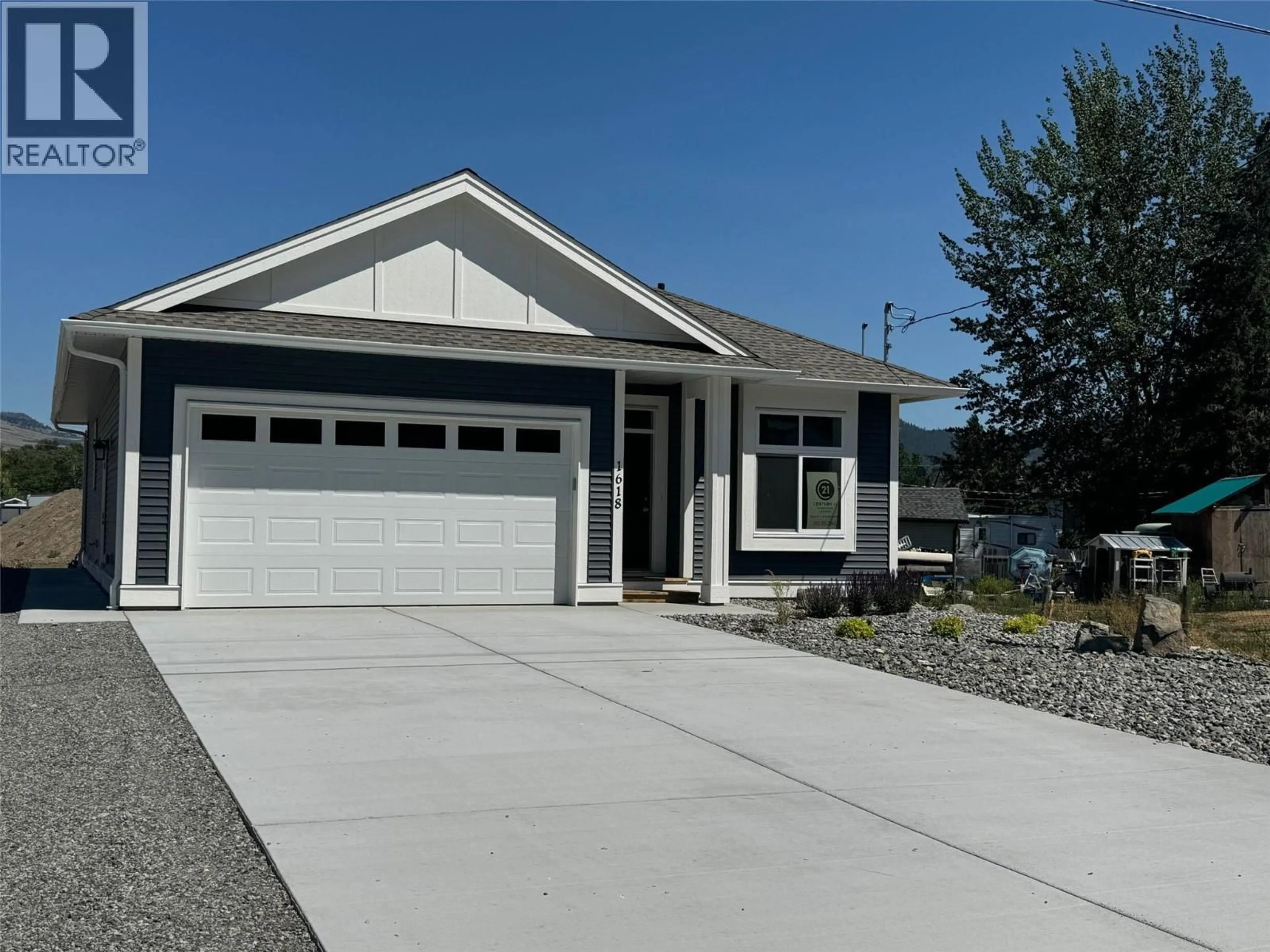 Home with vinyl exterior material, street for 1618 PINE STREET, Merritt British Columbia V1K1K8
