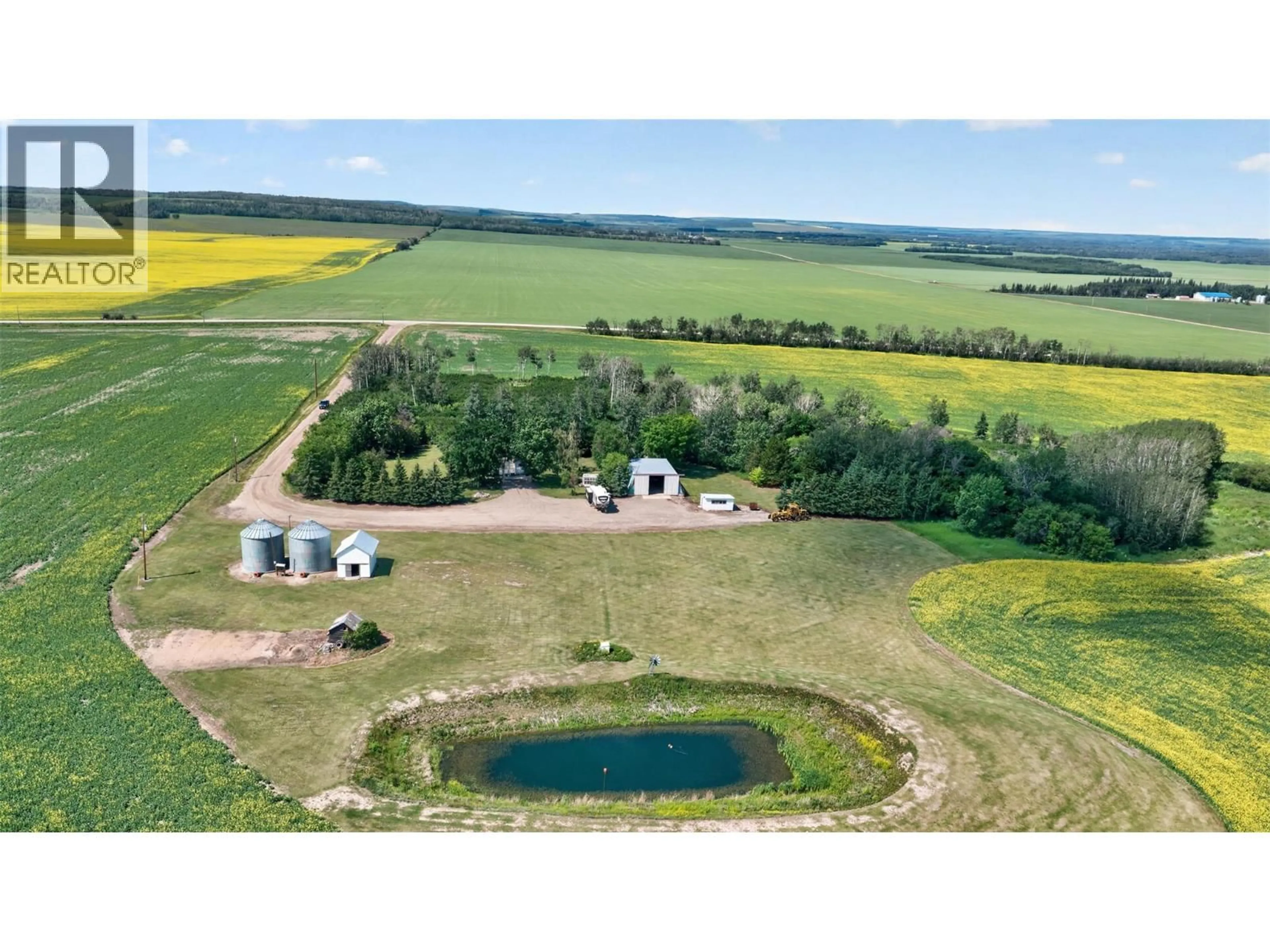 A pic from outside/outdoor area/front of a property/back of a property/a pic from drone, unknown for 4490 ROLLA ROAD, Dawson Creek British Columbia V0C2G0