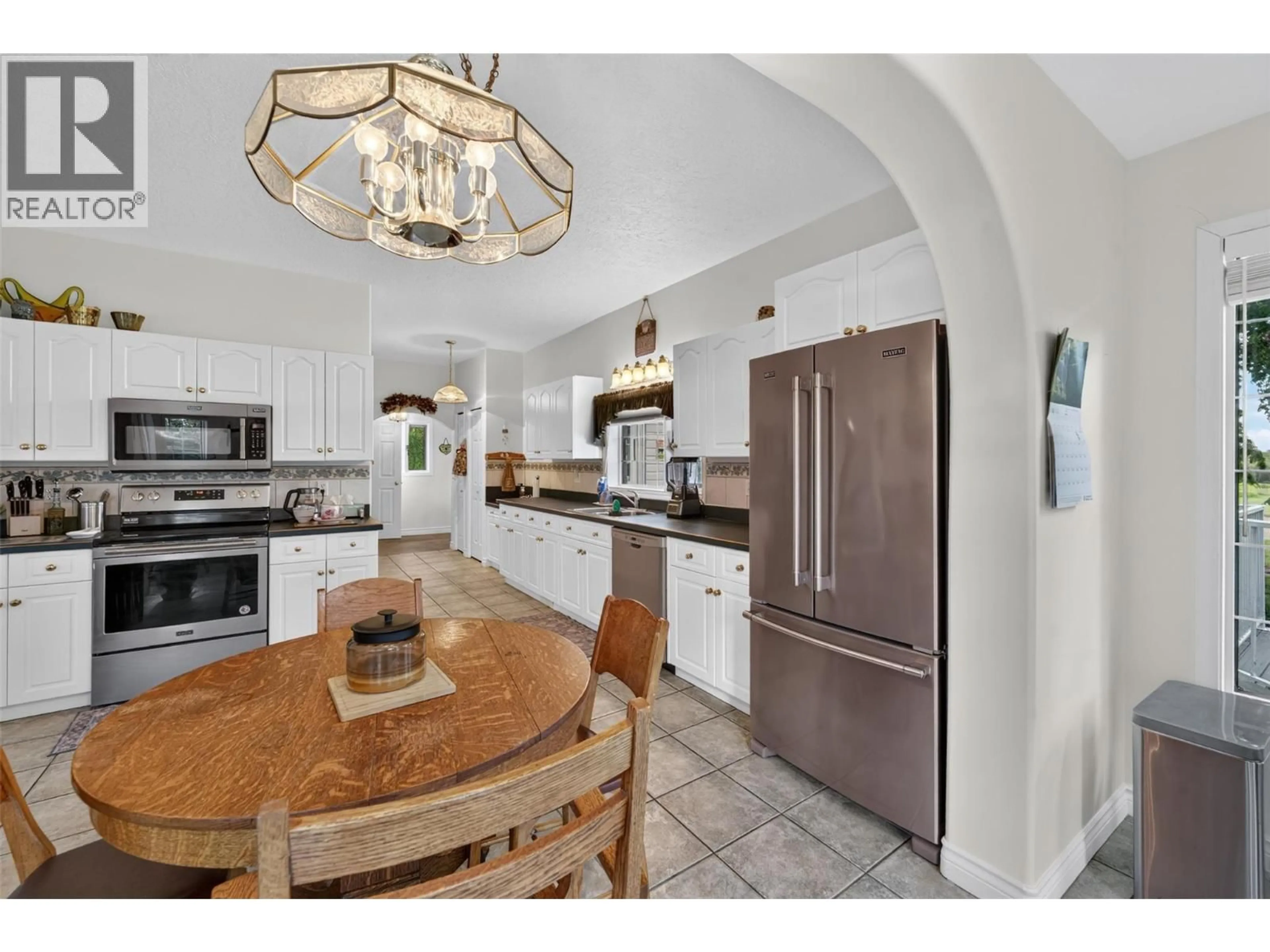Open concept kitchen, ceramic/tile floor for 4490 ROLLA ROAD, Dawson Creek British Columbia V0C2G0