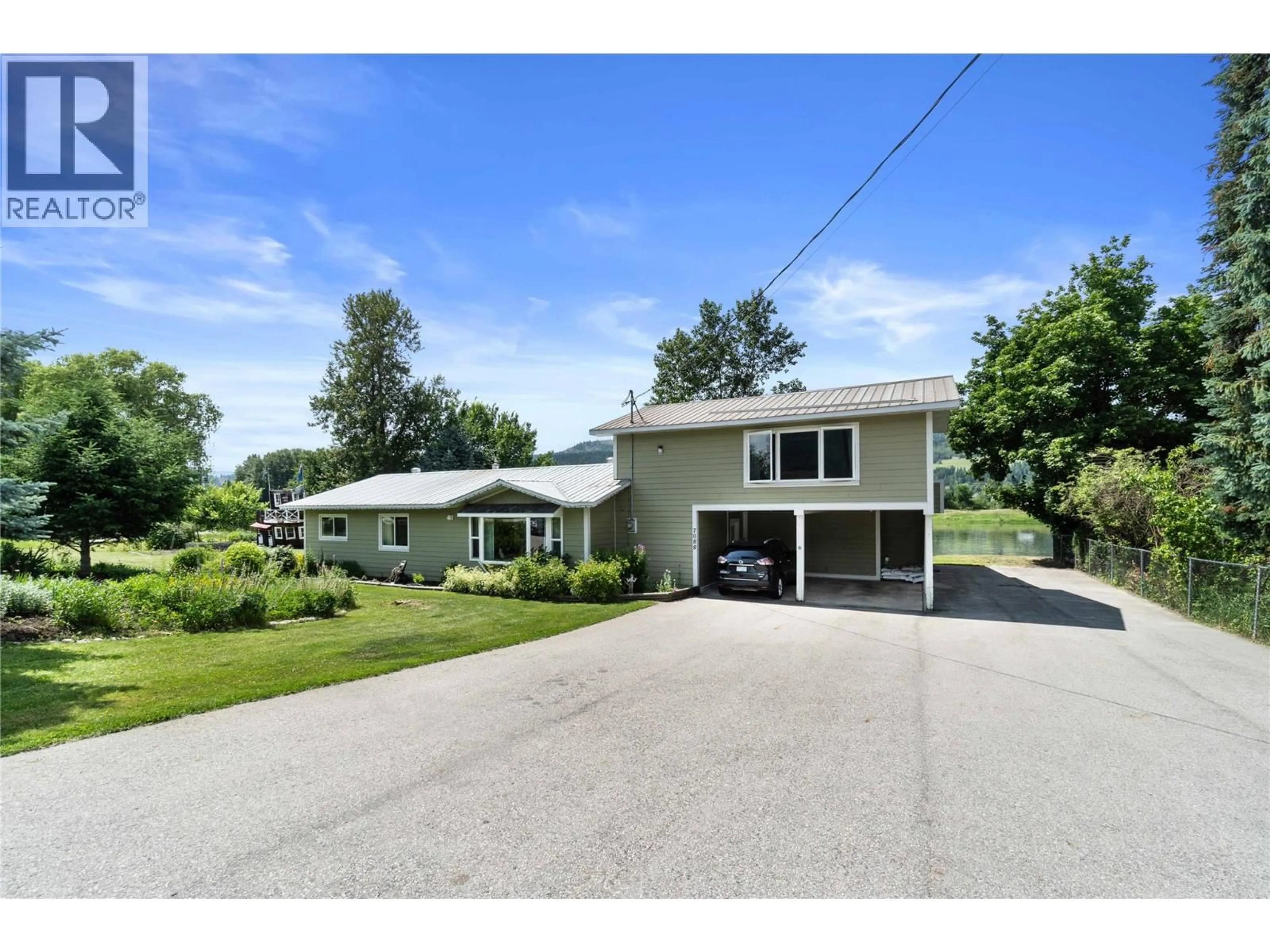 A pic from outside/outdoor area/front of a property/back of a property/a pic from drone, street for 7088 97A HIGHWAY, Grindrod British Columbia V0E1Y0